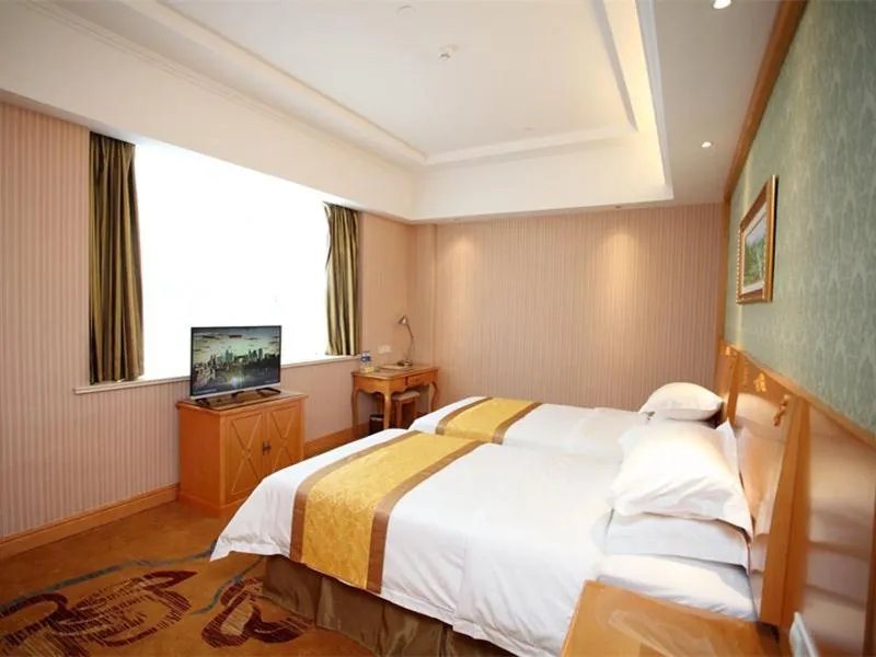 Bed in Vienna Hotel Jiangsu Kunshan Exhibition Center