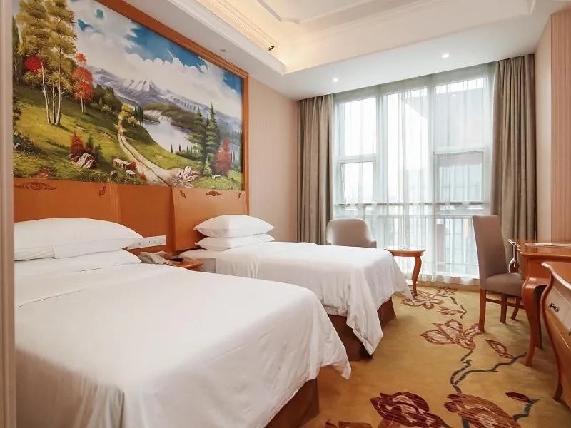 Bed in Vienna Hotel Nanjing Olympic Sports Center