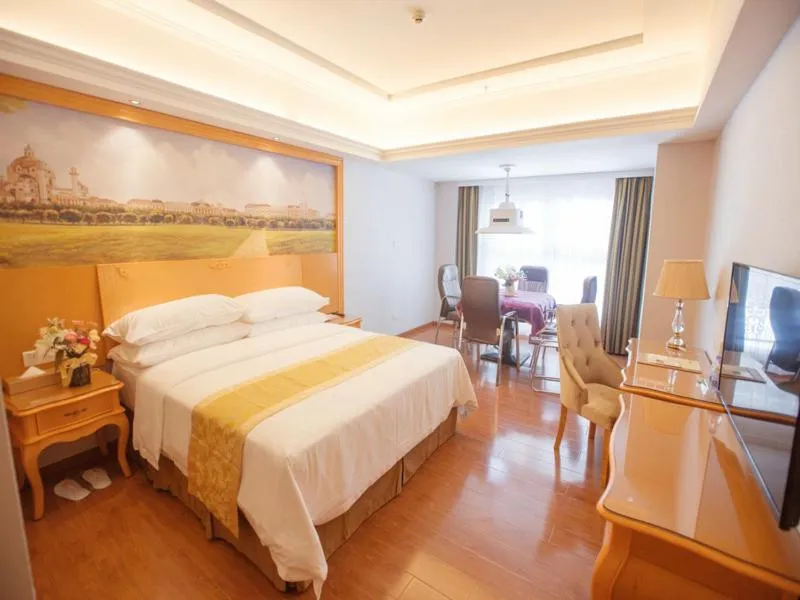Bed in Vienna Hotel Guangdong Huizhou Jiangbei Sanxin