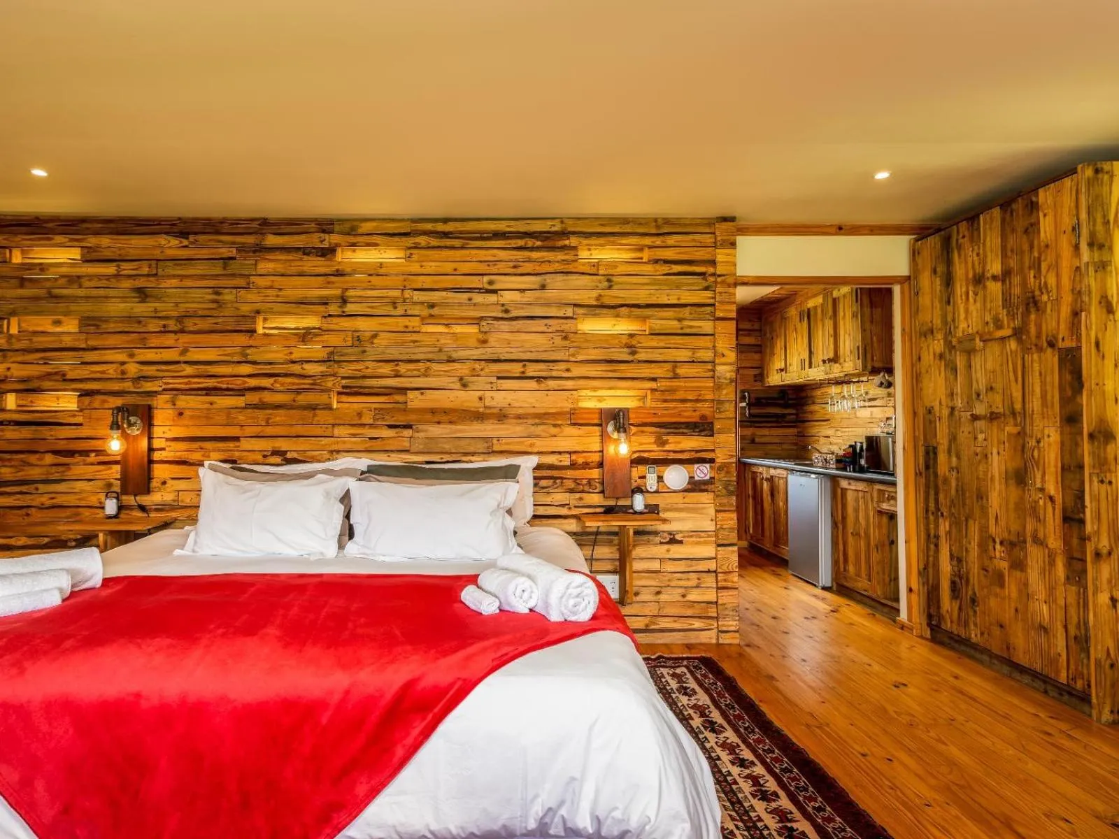 Photo of the whole room, Bed in The Log Collective