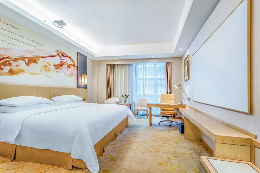 Bed in Vienna International Hotel Guangdong Zhengjiang Renming Avenue Middle Road