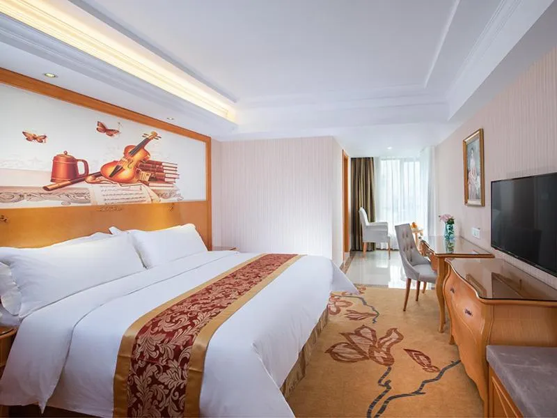 Bed in Vienna Hotel Shenzhen Gongming Huafa North Road