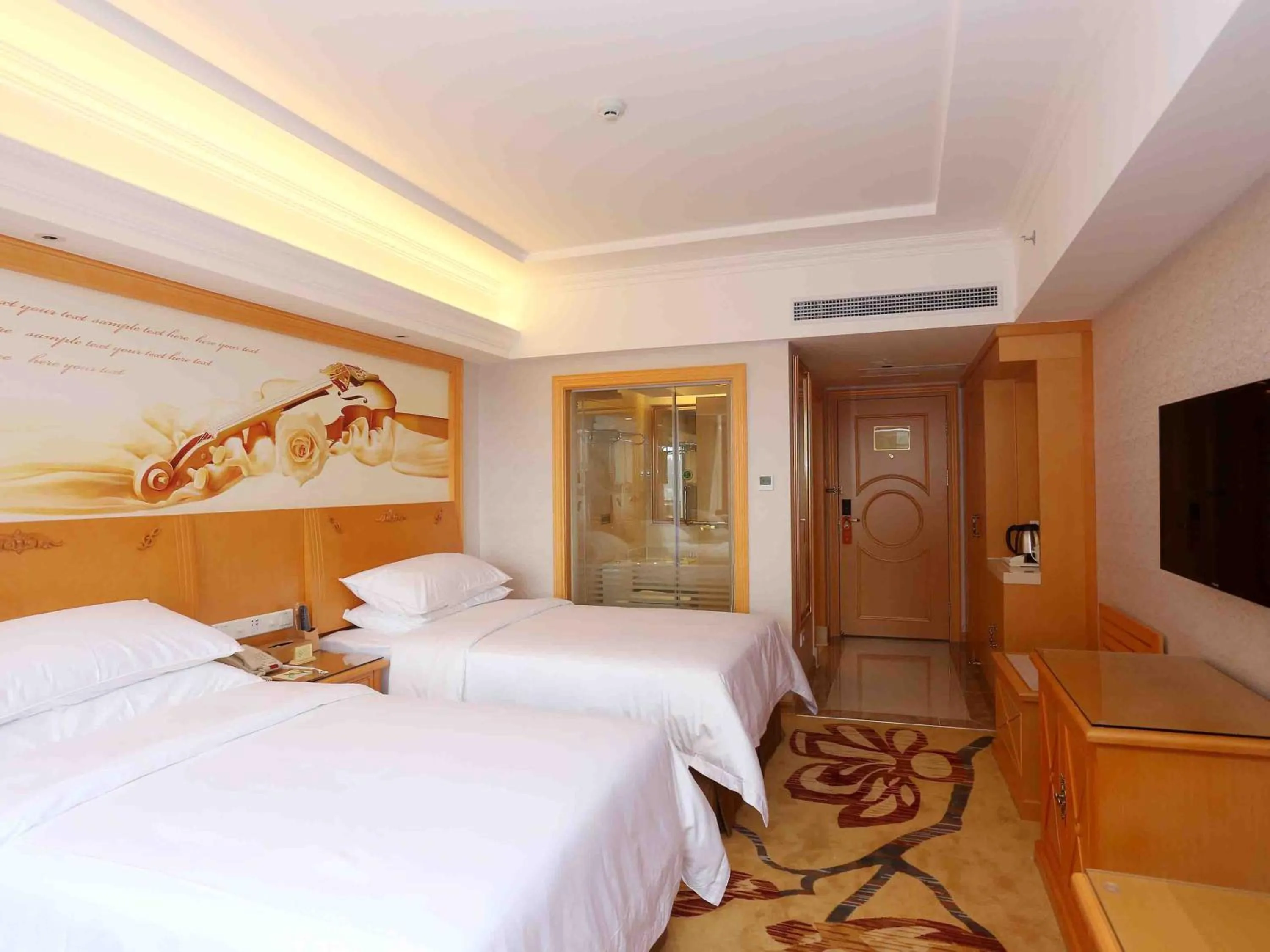 Bed in Vienna Hotel Zhongshan West District