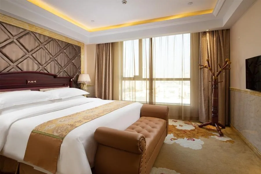 Bed in Vienna International Hotel Taicang Wanda Square