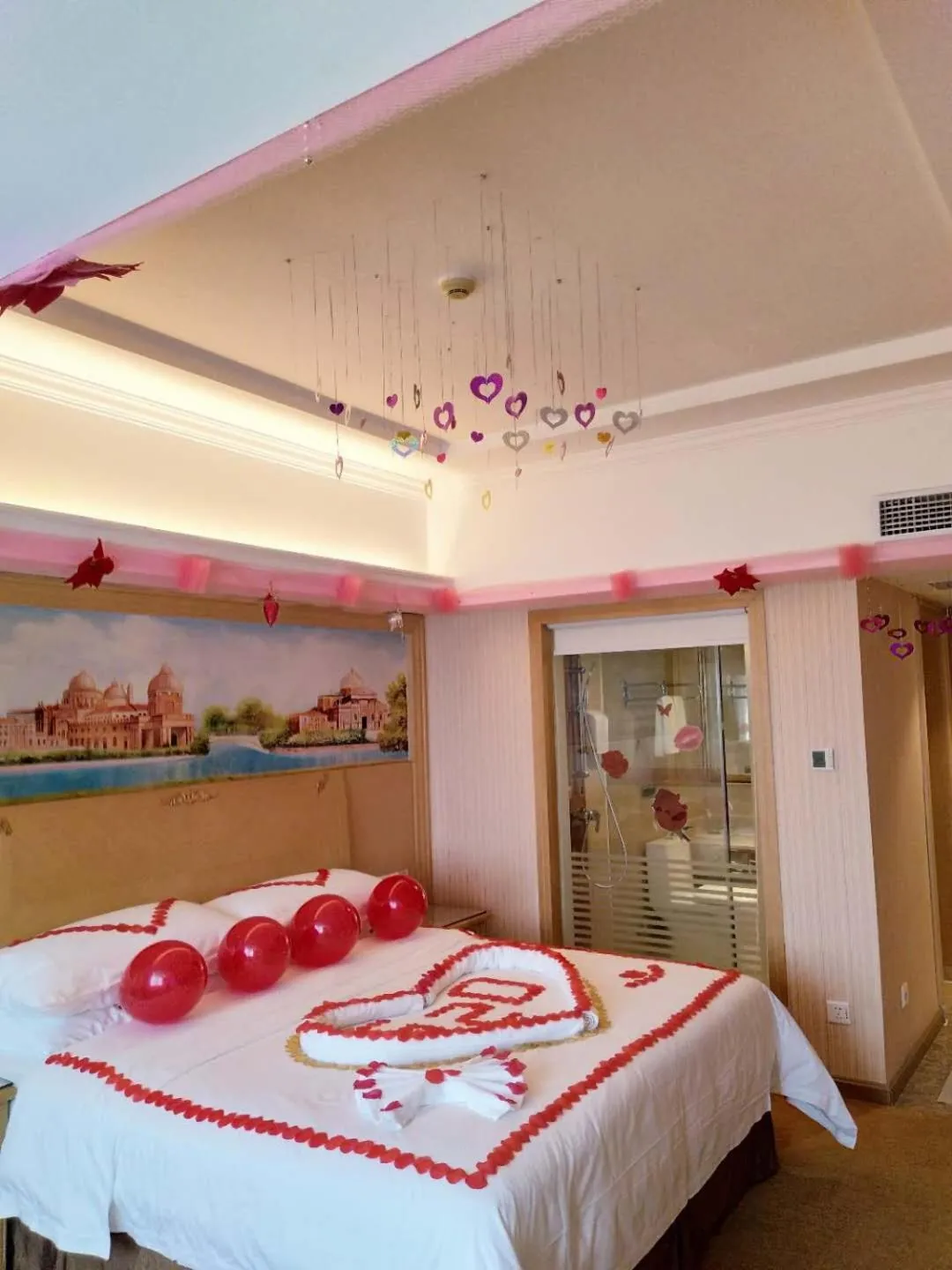 Bed in Vienna Hotel Huizhou Dahuxi