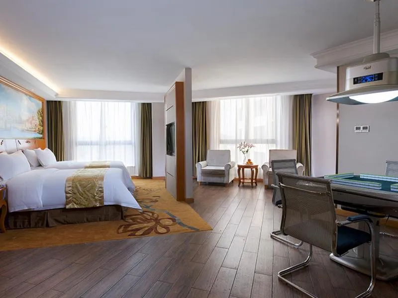 Bed in Vienna International Hotel Changsha Shumuling Subway Station