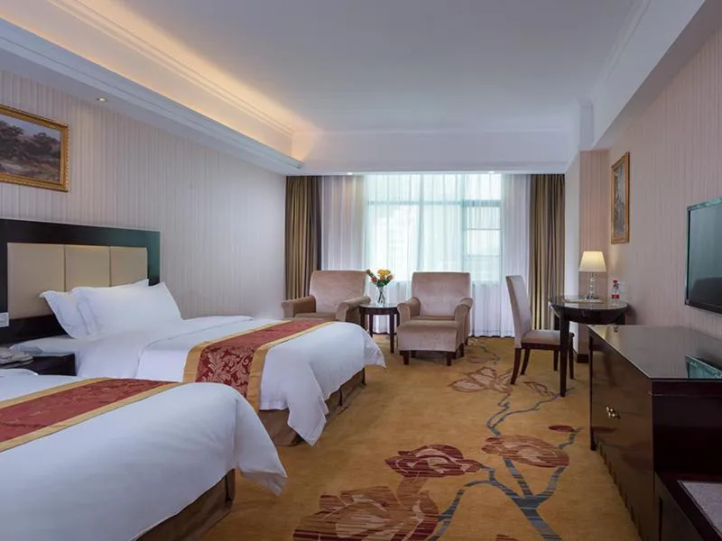 Bed in Vienna Hotel Baoan Liutang