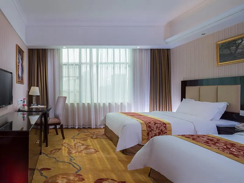 Bed in Vienna Hotel Baoan Liutang