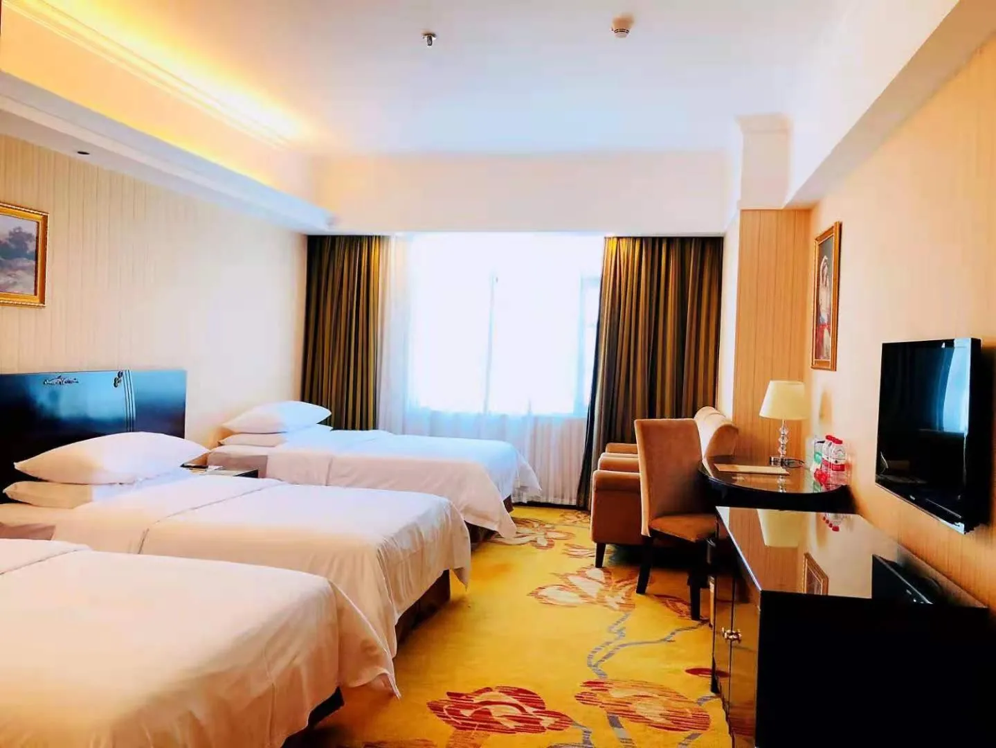 Bed in Vienna Hotel Baoan Liutang