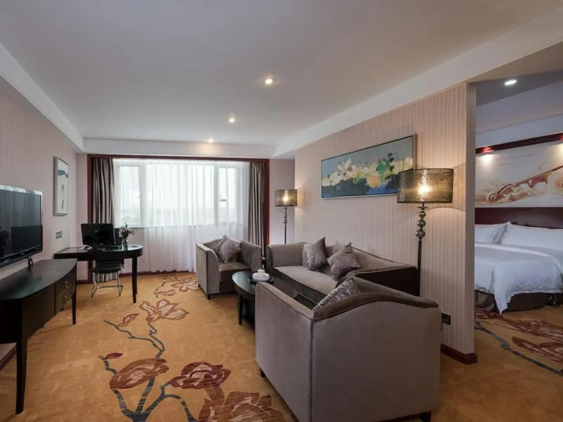 Bed in Vienna International Hotel Shantou Chenghai Waisha Bridge