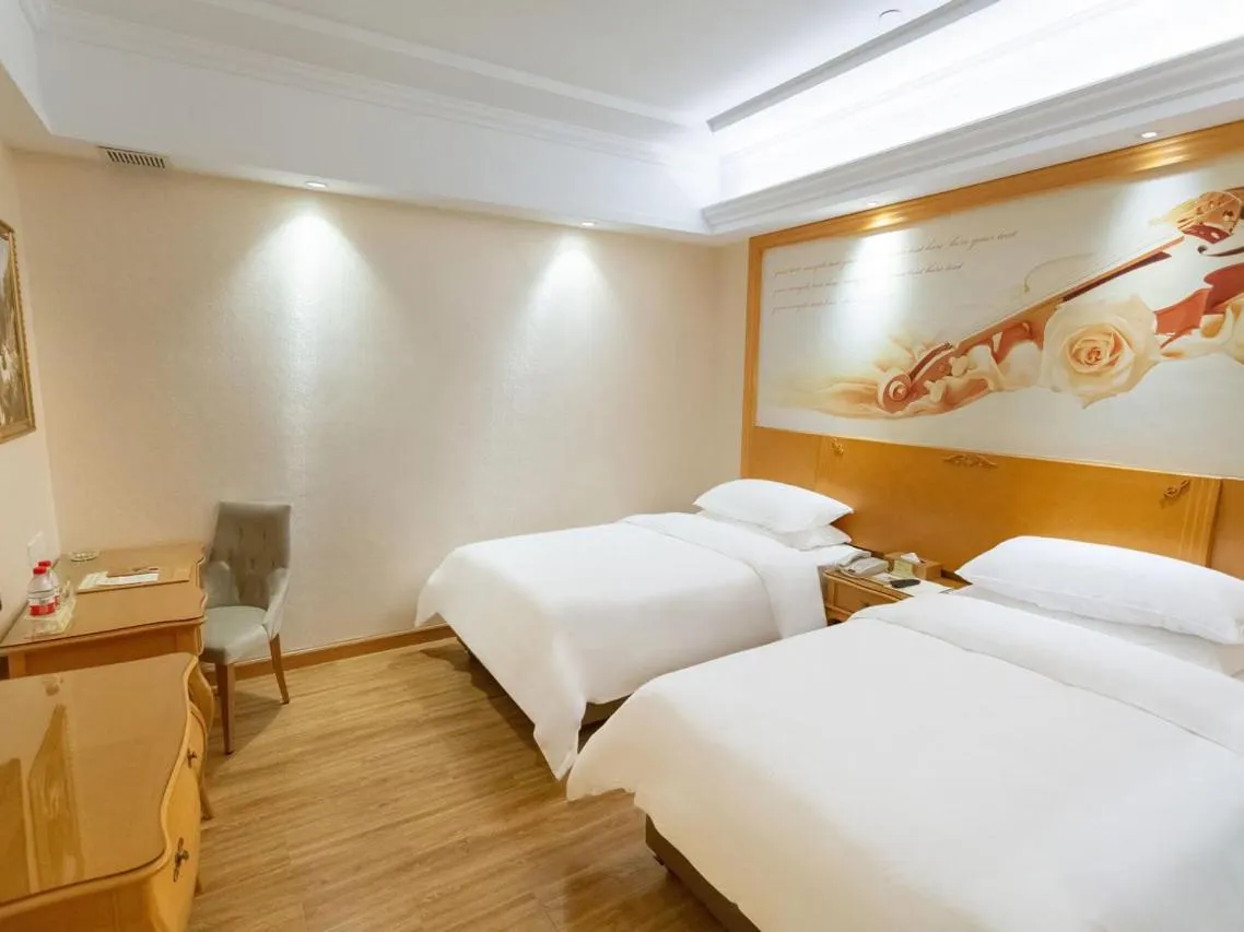 Bed in Vienna Hotel Guangzhou Beijing Road