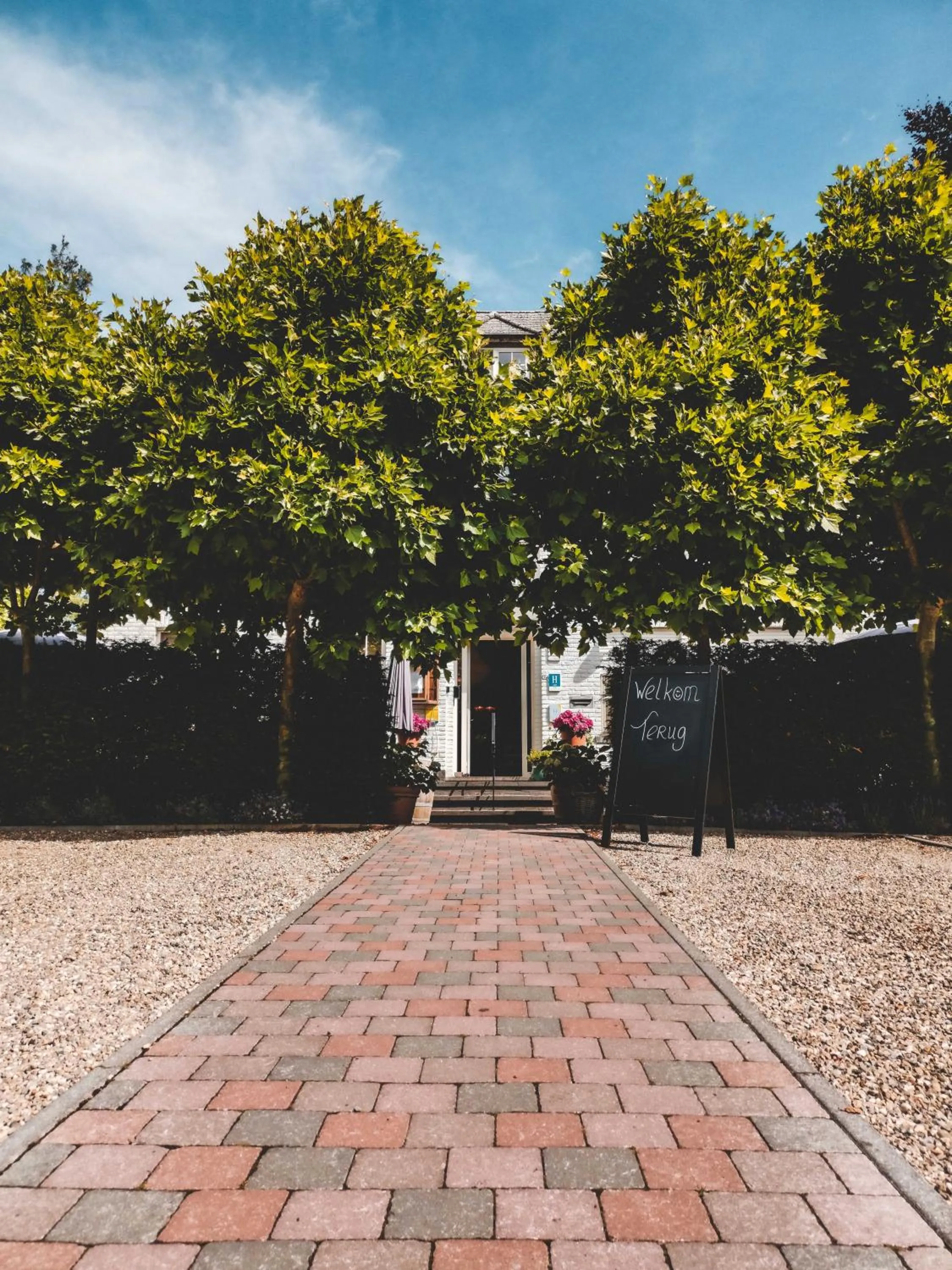 Property building in Hotel Au Nom De Dieu