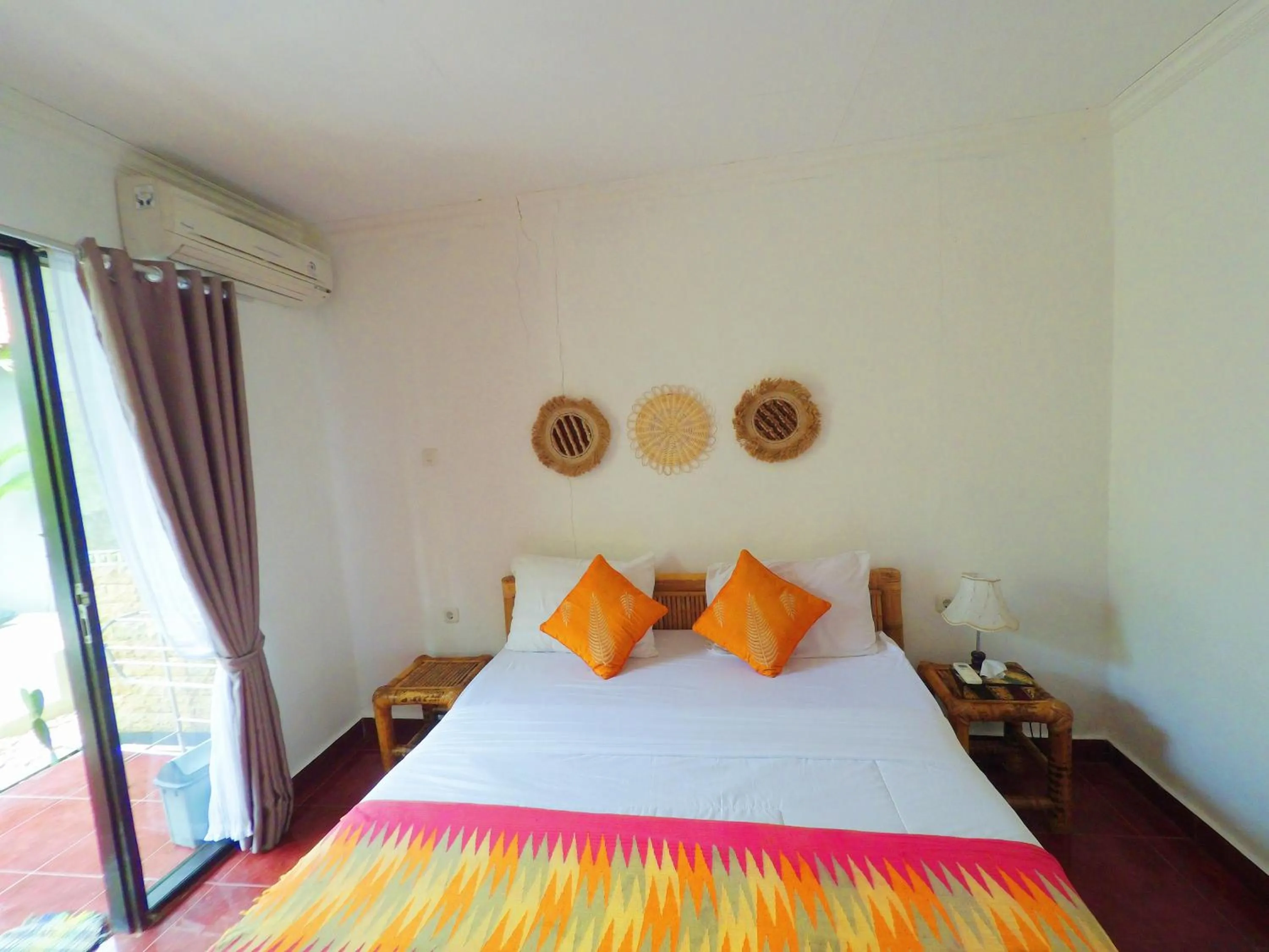 Bed in Tropical Garden Inn