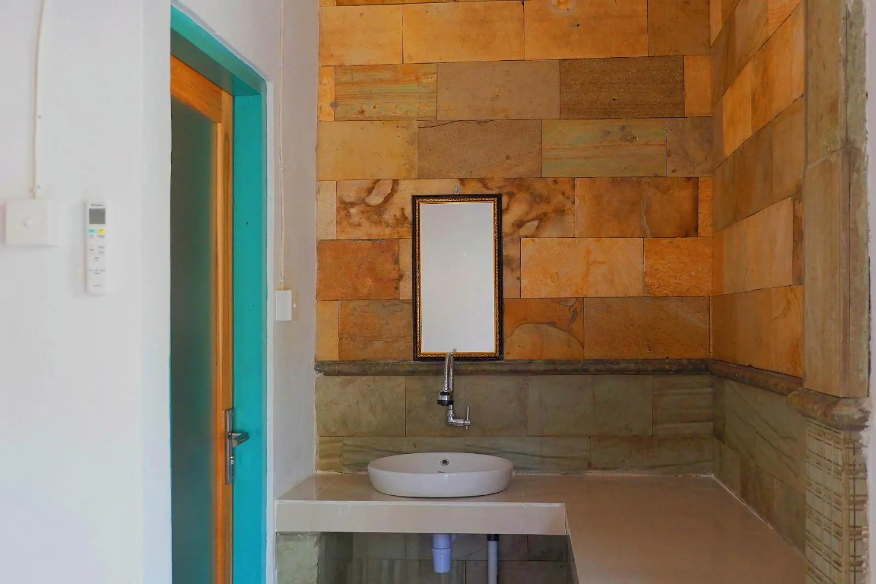 Bathroom in Tropical Garden Inn