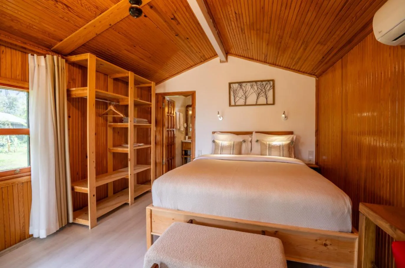 Bed in Etenna Beach Bungalows