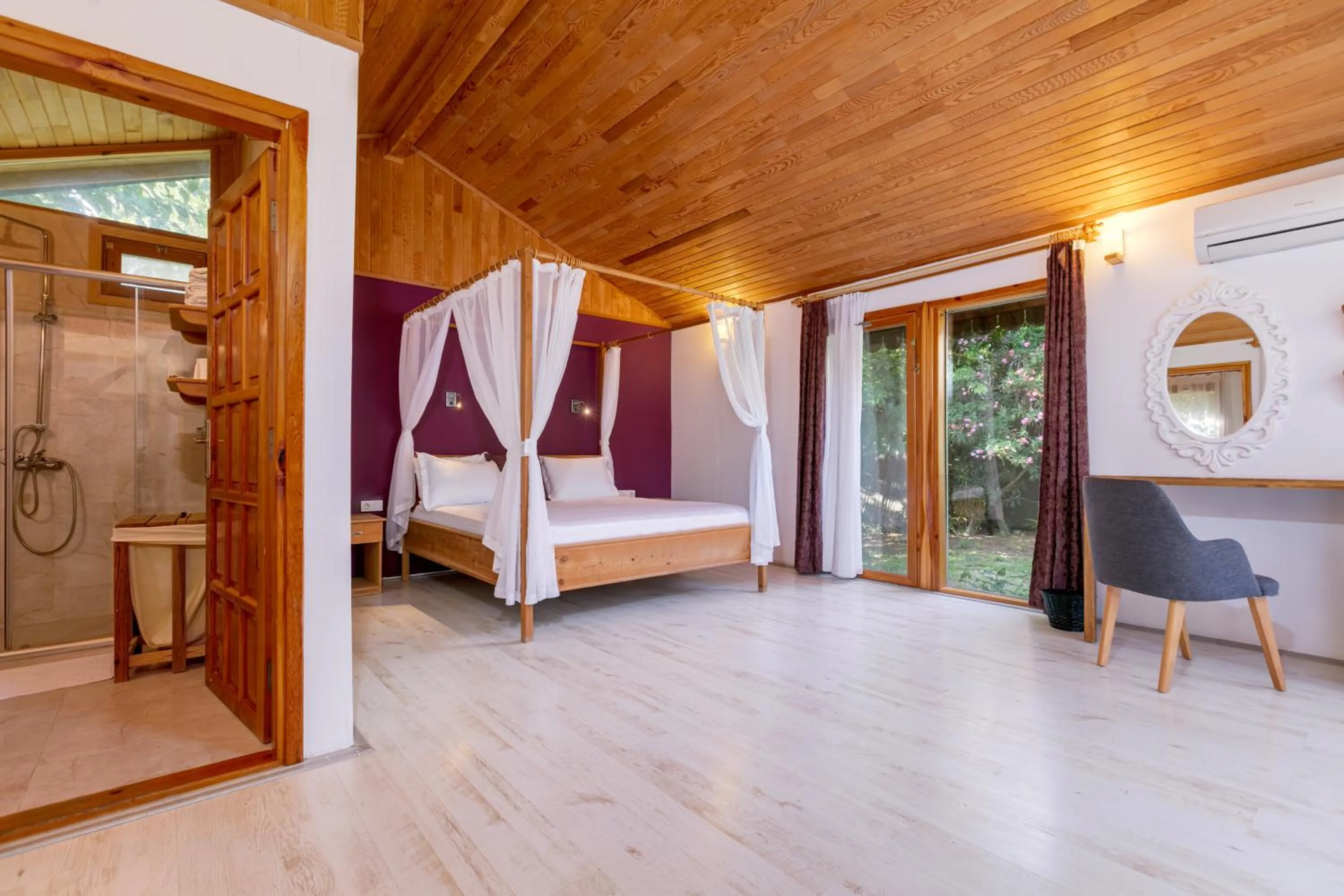 Bed in Etenna Beach Bungalows