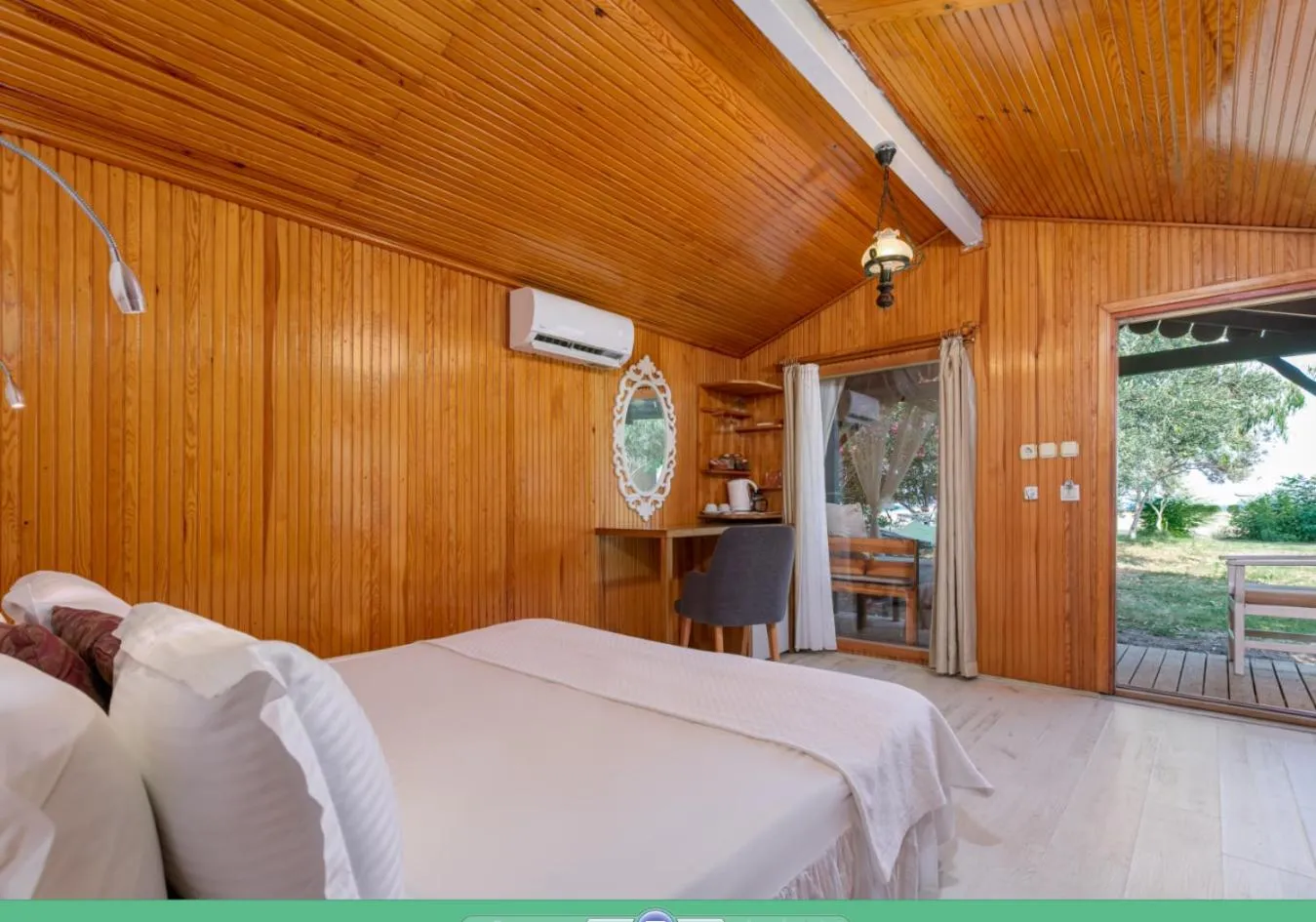 Bed in Etenna Beach Bungalows