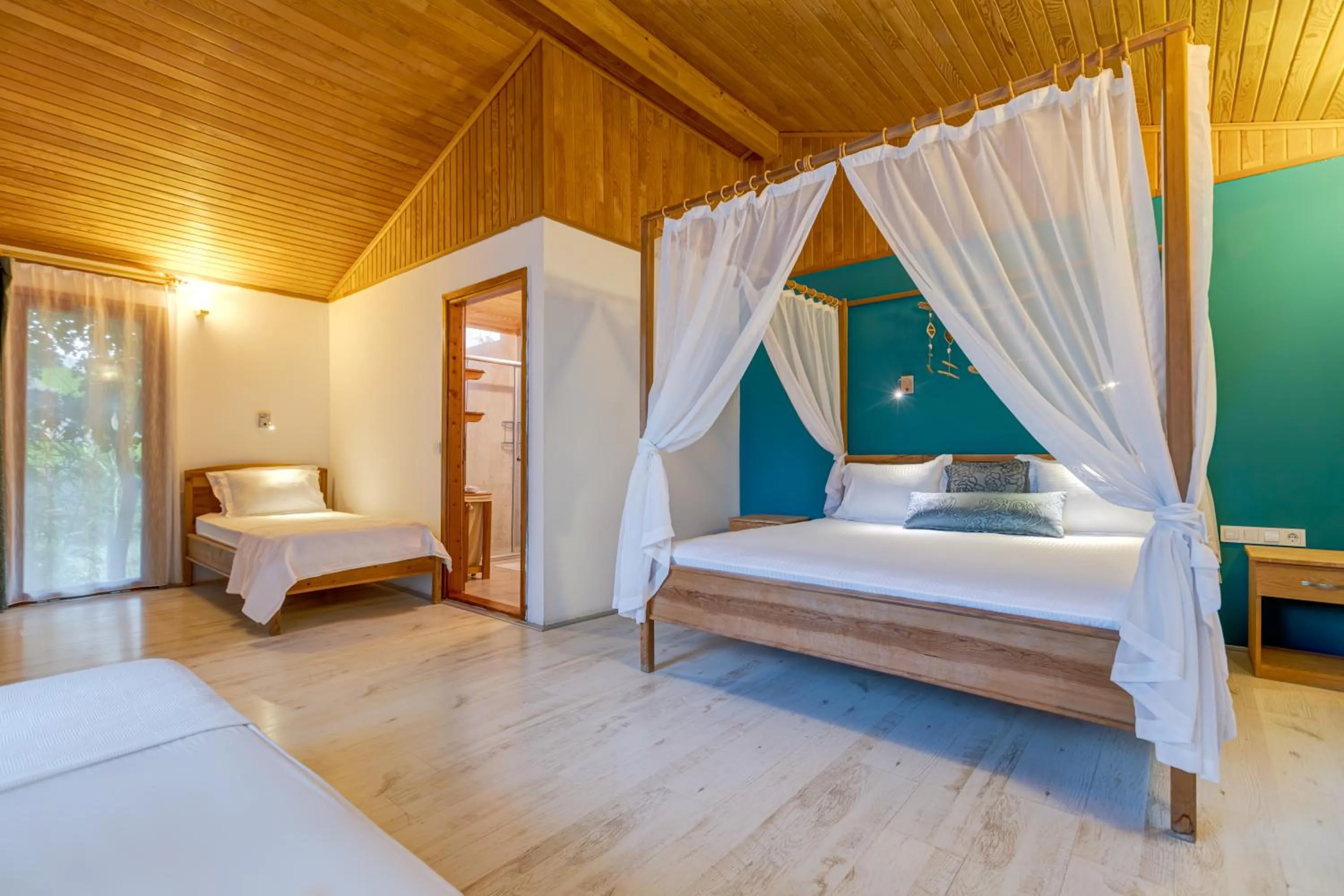 Bed in Etenna Beach Bungalows