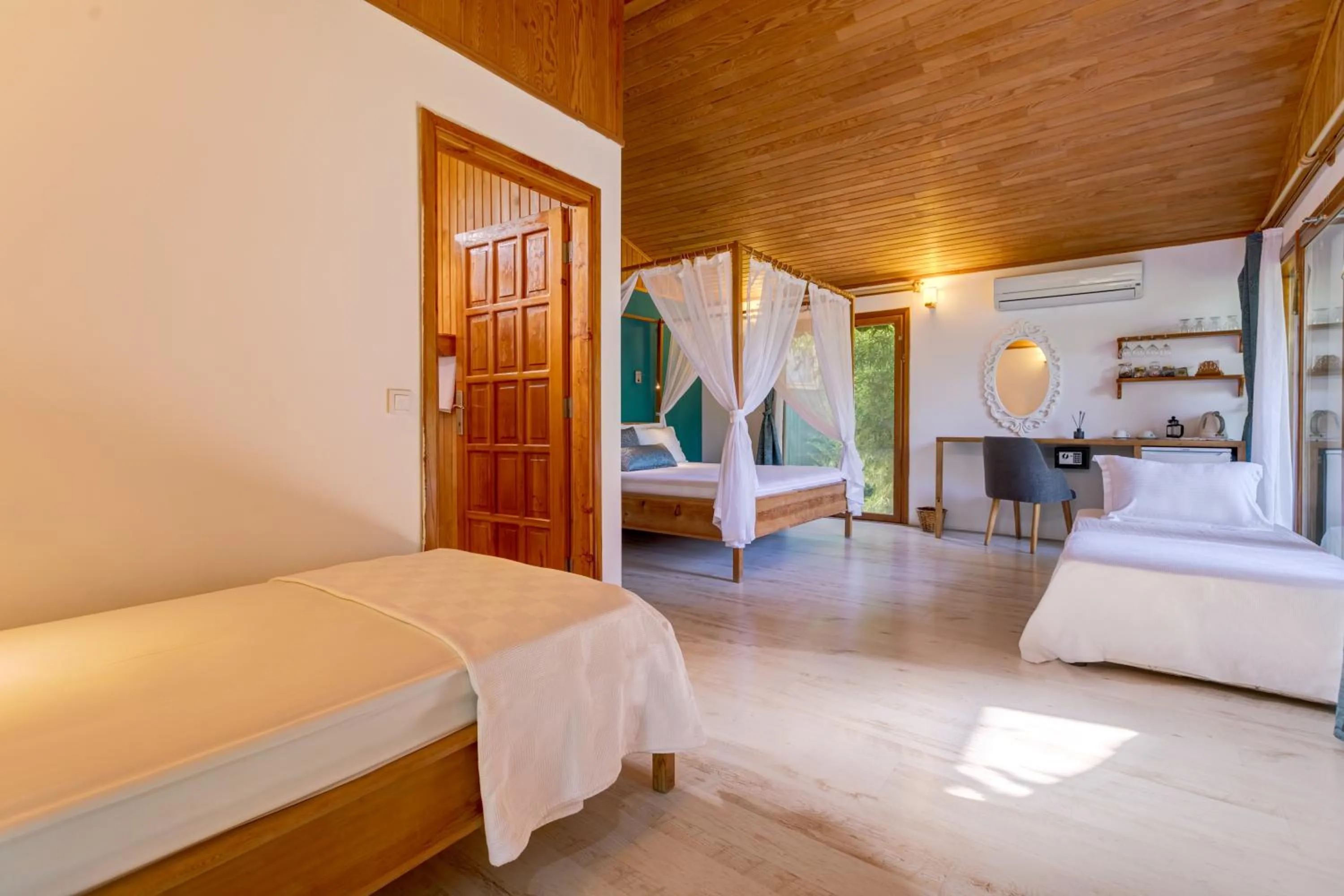 Bed in Etenna Beach Bungalows