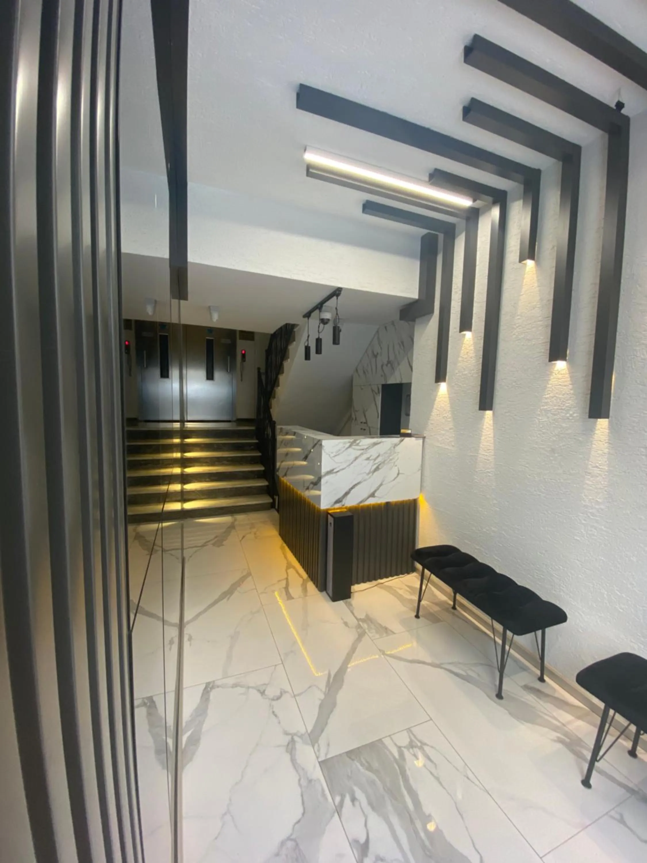 Lobby or reception in Dolce Vita Suite Hotel