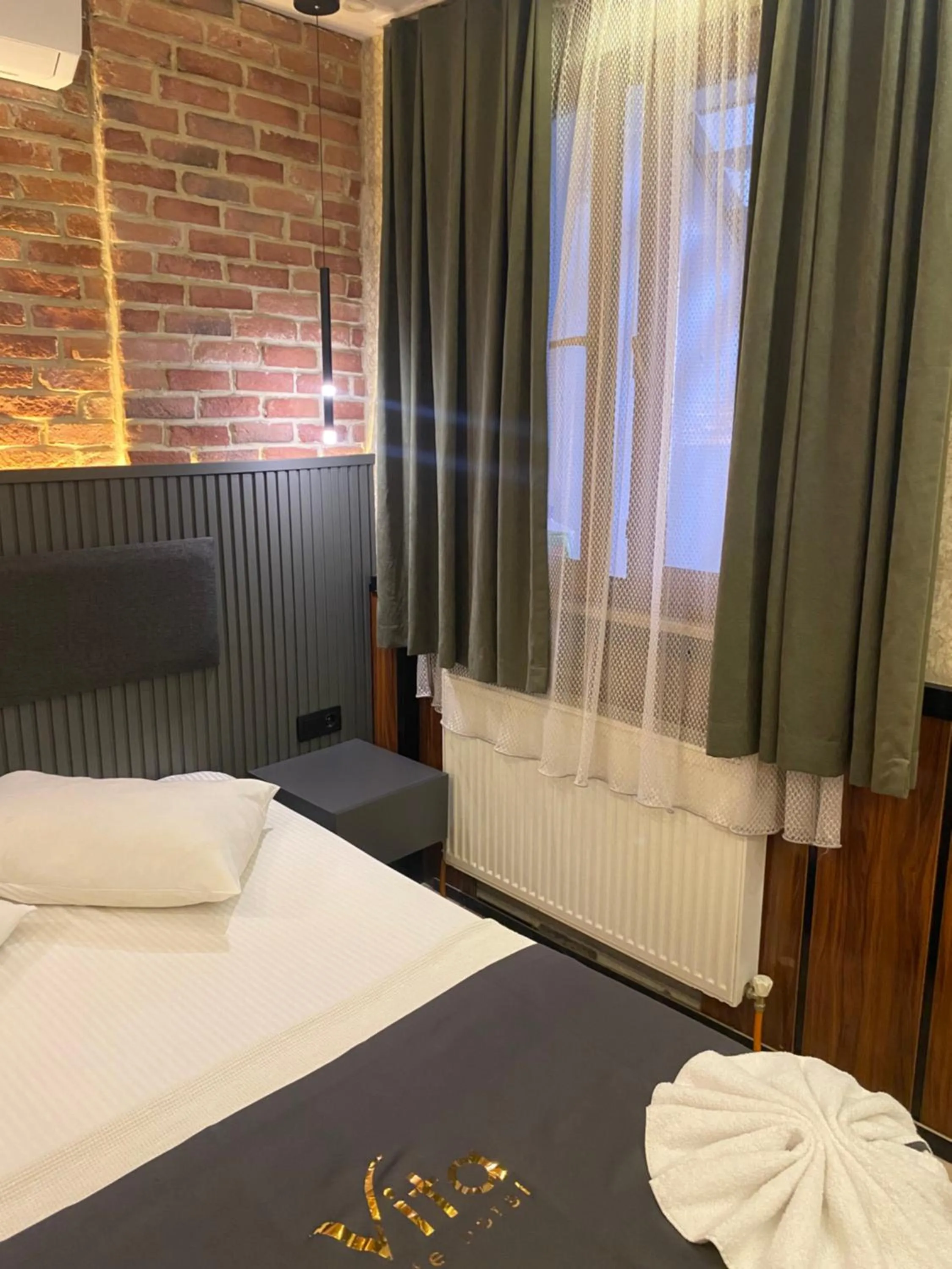 Photo of the whole room, Bed in Dolce Vita Suite Hotel