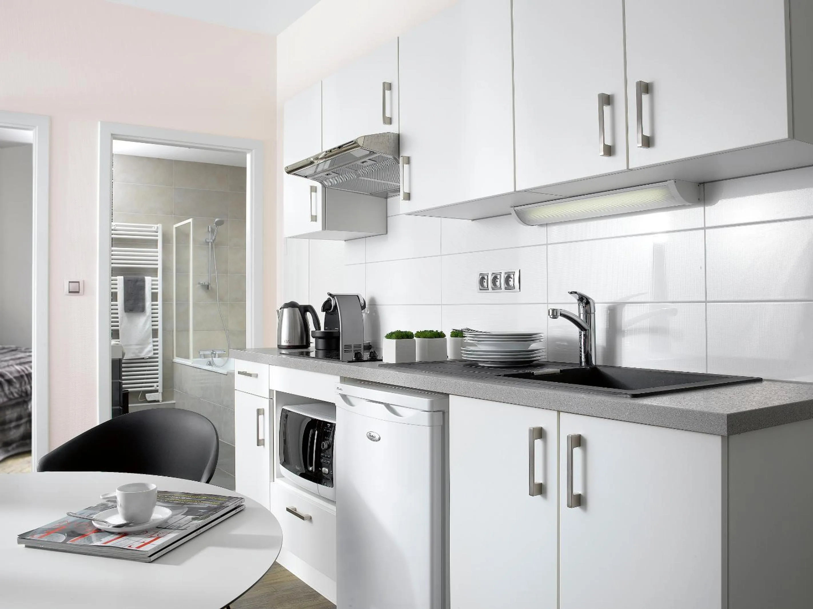 Kitchen or kitchenette in Appartements Le 32