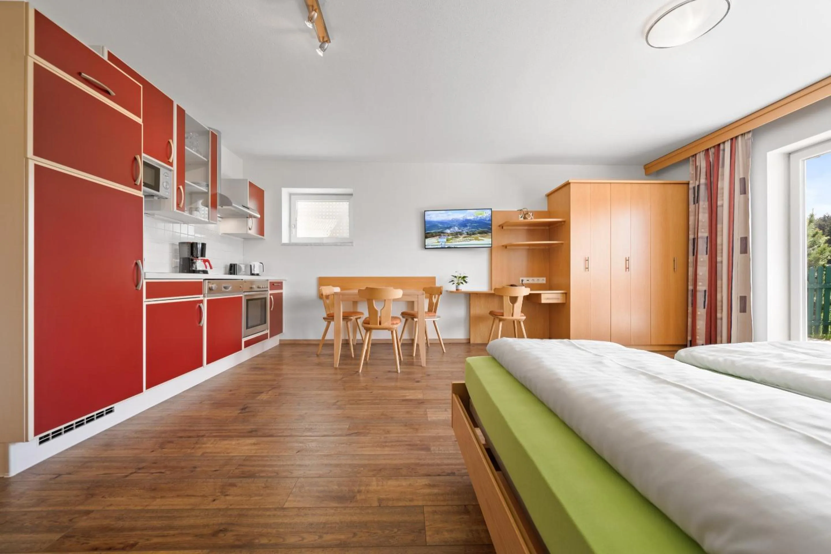 Kitchen or kitchenette, Bed in Aparthotel Sunrise