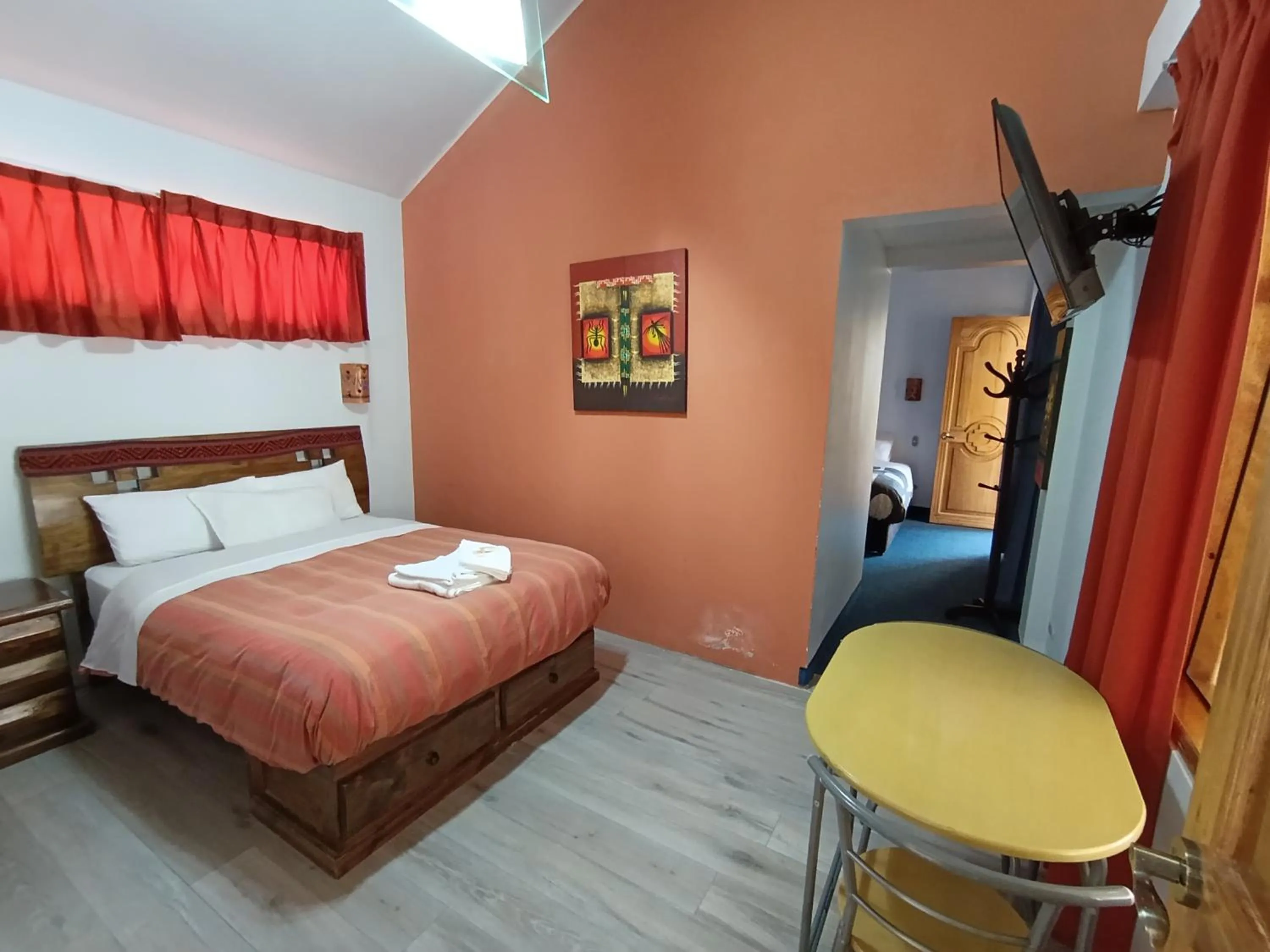 Communal lounge/ TV room, Bed in Ccapac Inka Ollanta Casa Museo