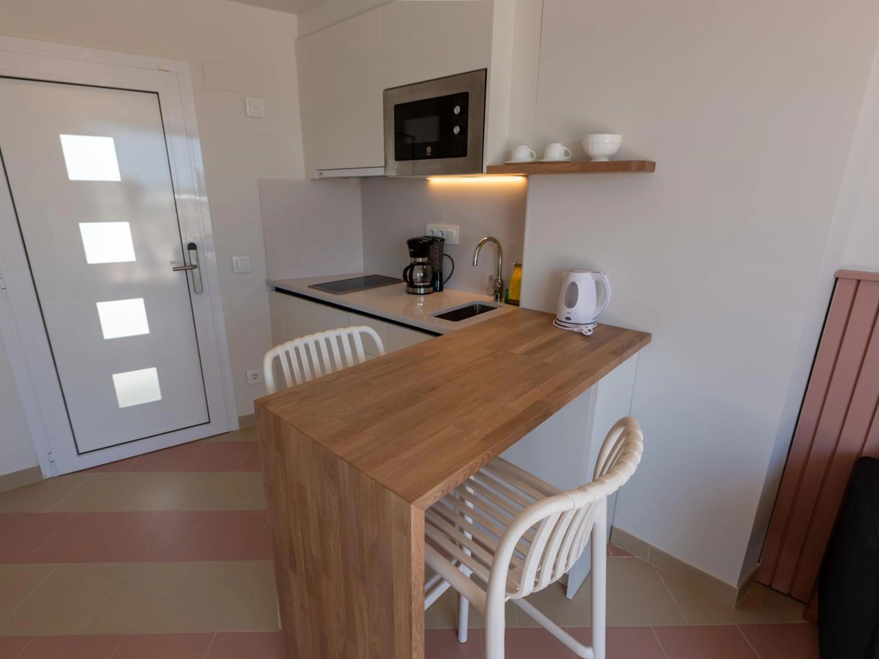 Kitchen or kitchenette in Apartamentos Sunway Atlanta