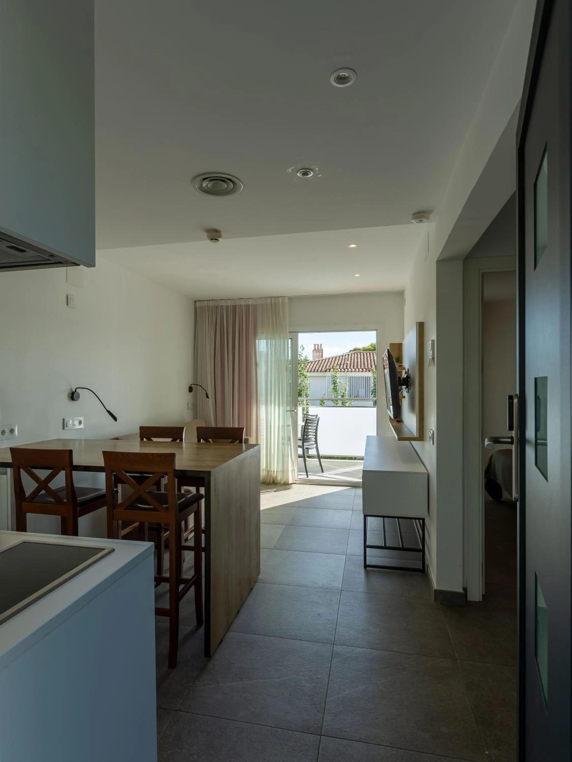 Kitchen or kitchenette in Apartamentos Sunway Apollo