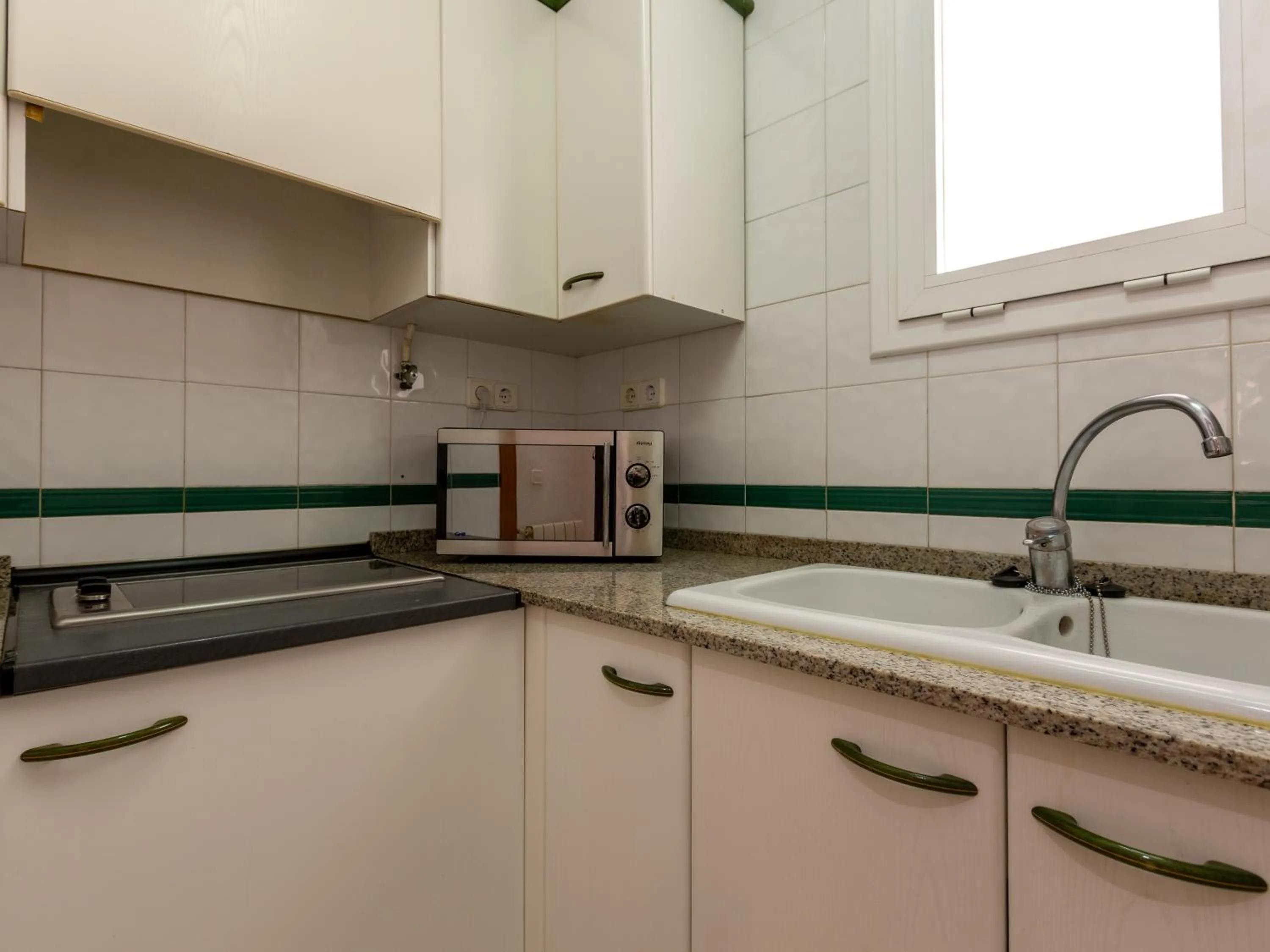 kitchen in Apartamentos Sunway San Jorge