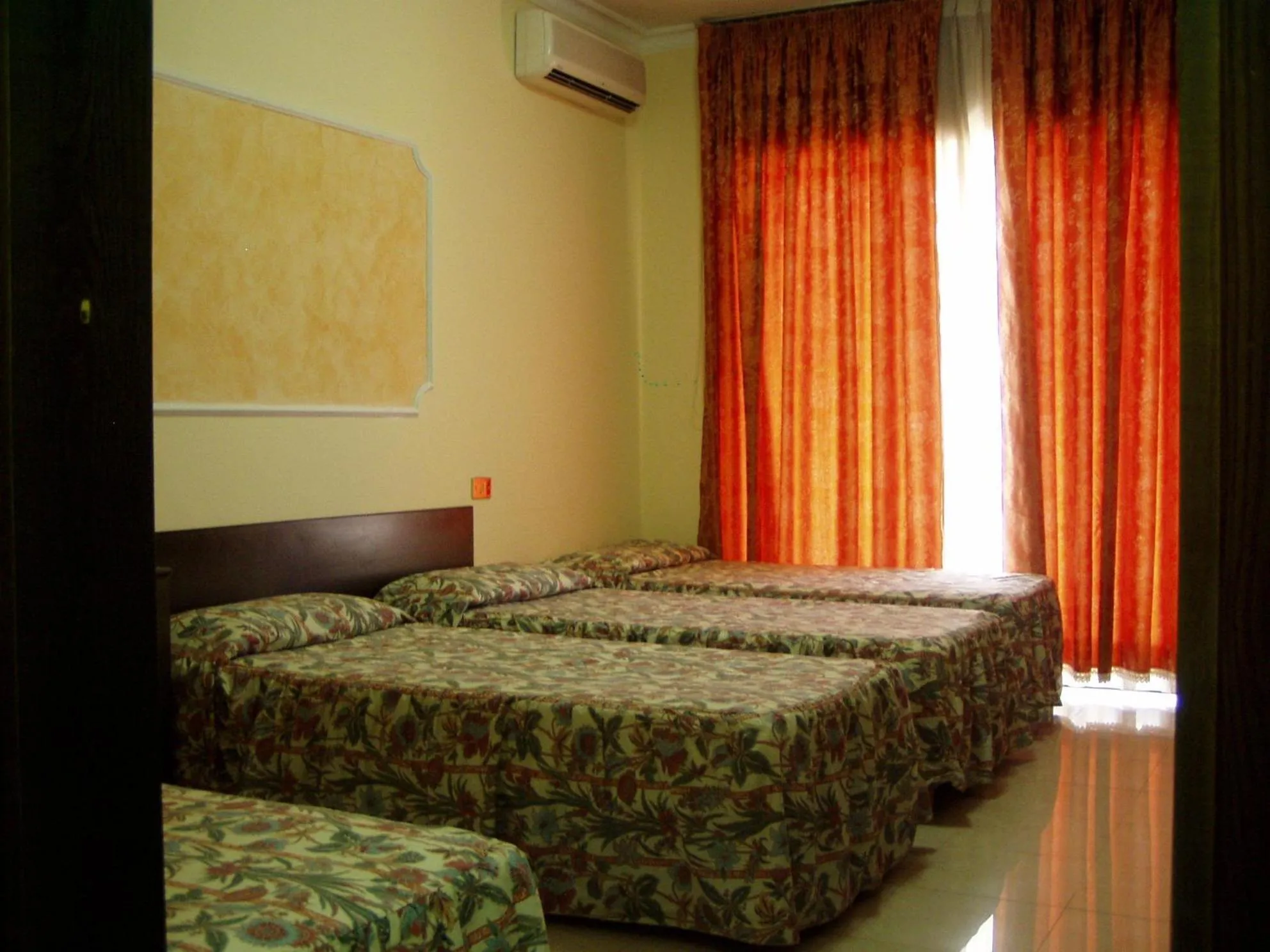 Bed in Hotel Le Dune