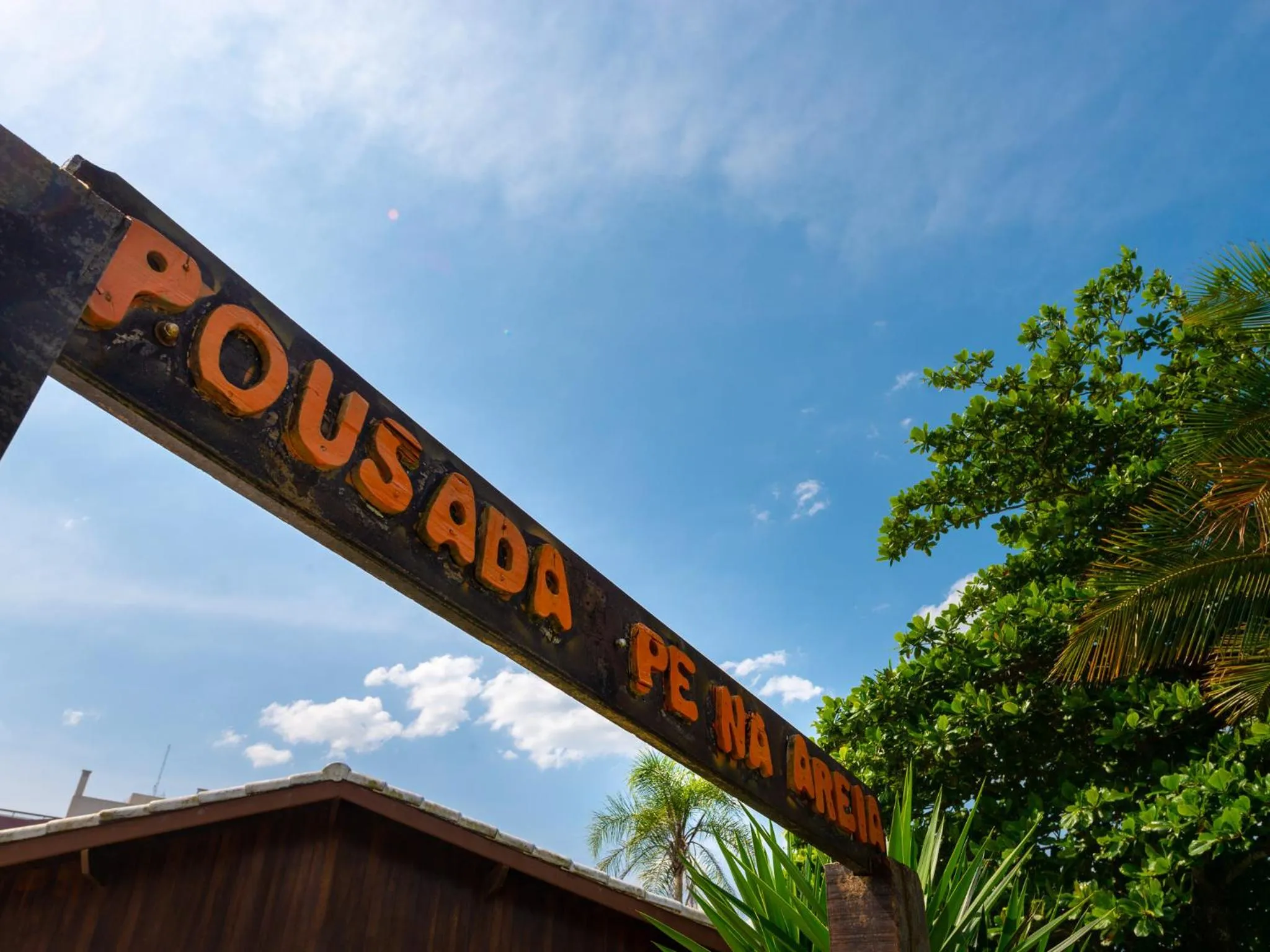 Property logo or sign in Pousada Pé Na Areia