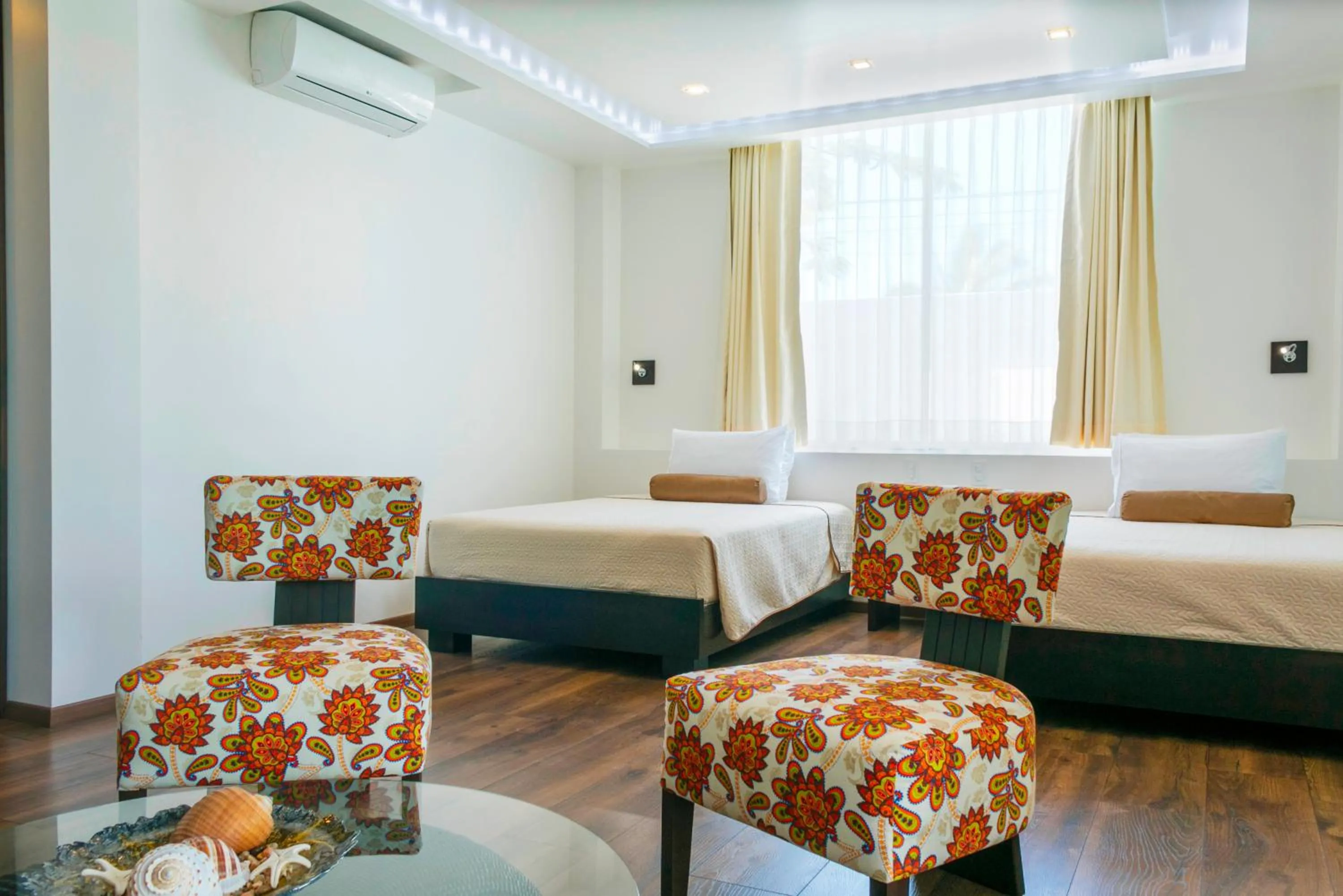 Bed in Ikala Galapagos Hotel