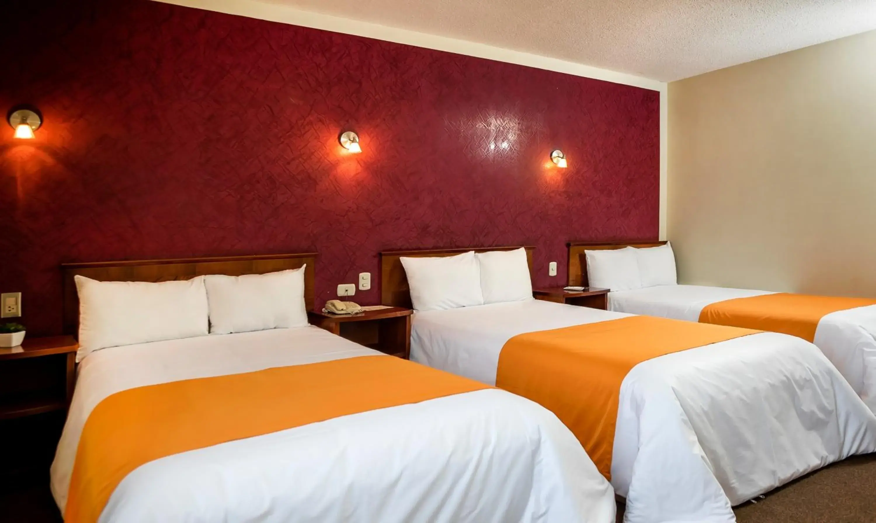 Triple Room in Hotel Maison Du Solei Triple Room in Hotel Maison Du Solei