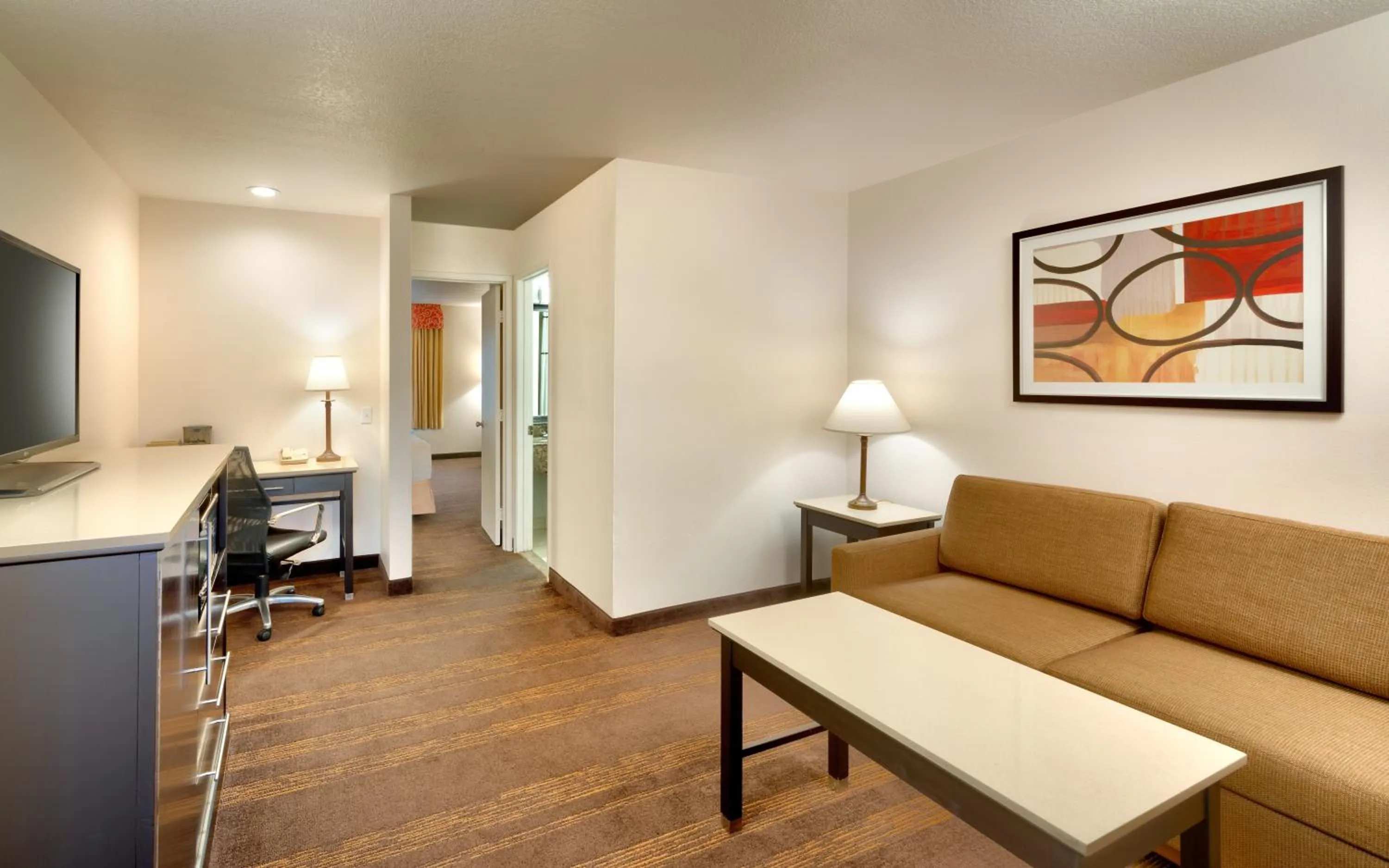 Communal lounge/ TV room in Cortona Inn and Suites Anaheim Resort