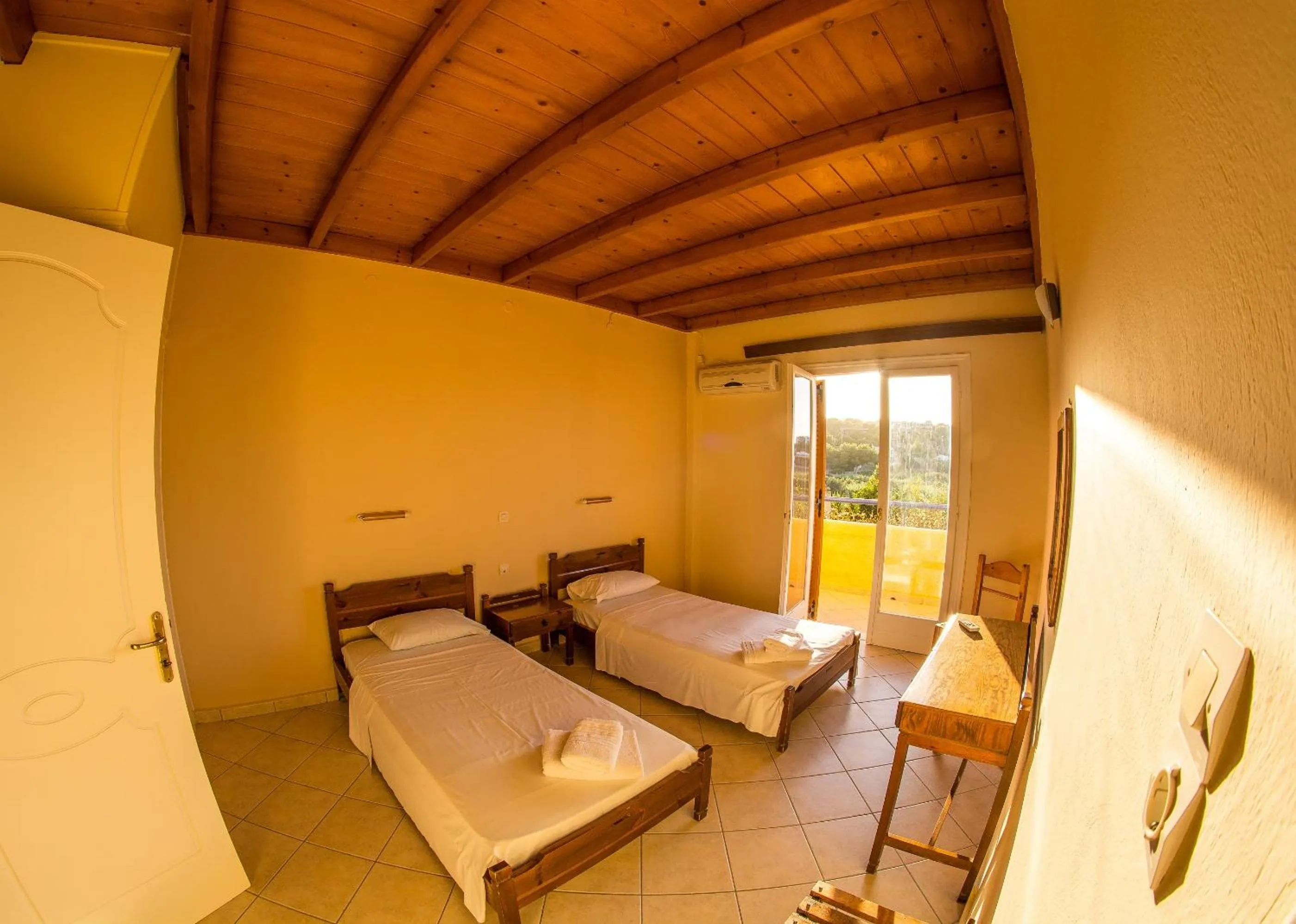 Bed in Vagia Beach Apartments, Aegina Island