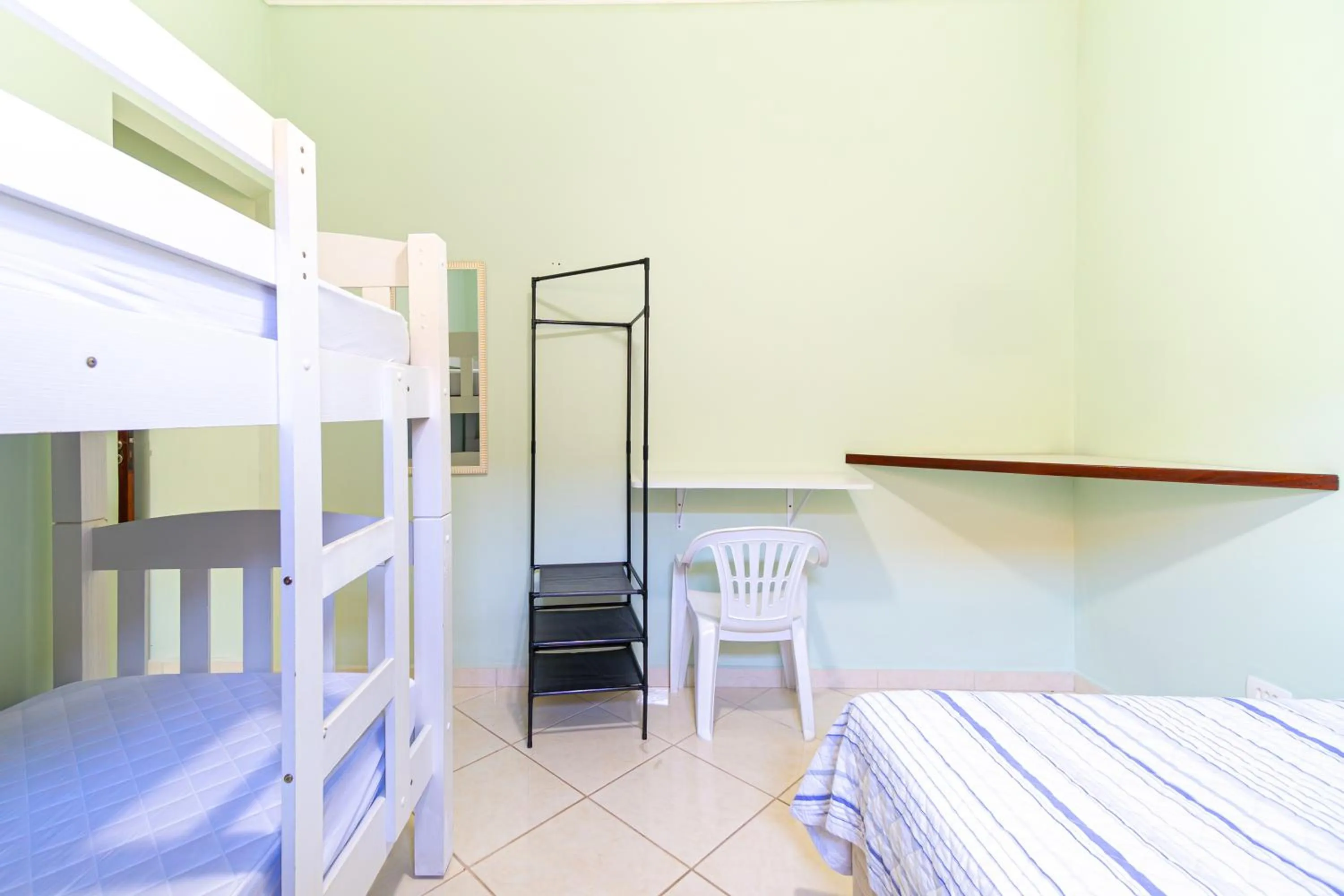 Bed in Casa Gomes com 3 suítes e ar-condicionado até 12 pessoas em Ubatuba Itaguá