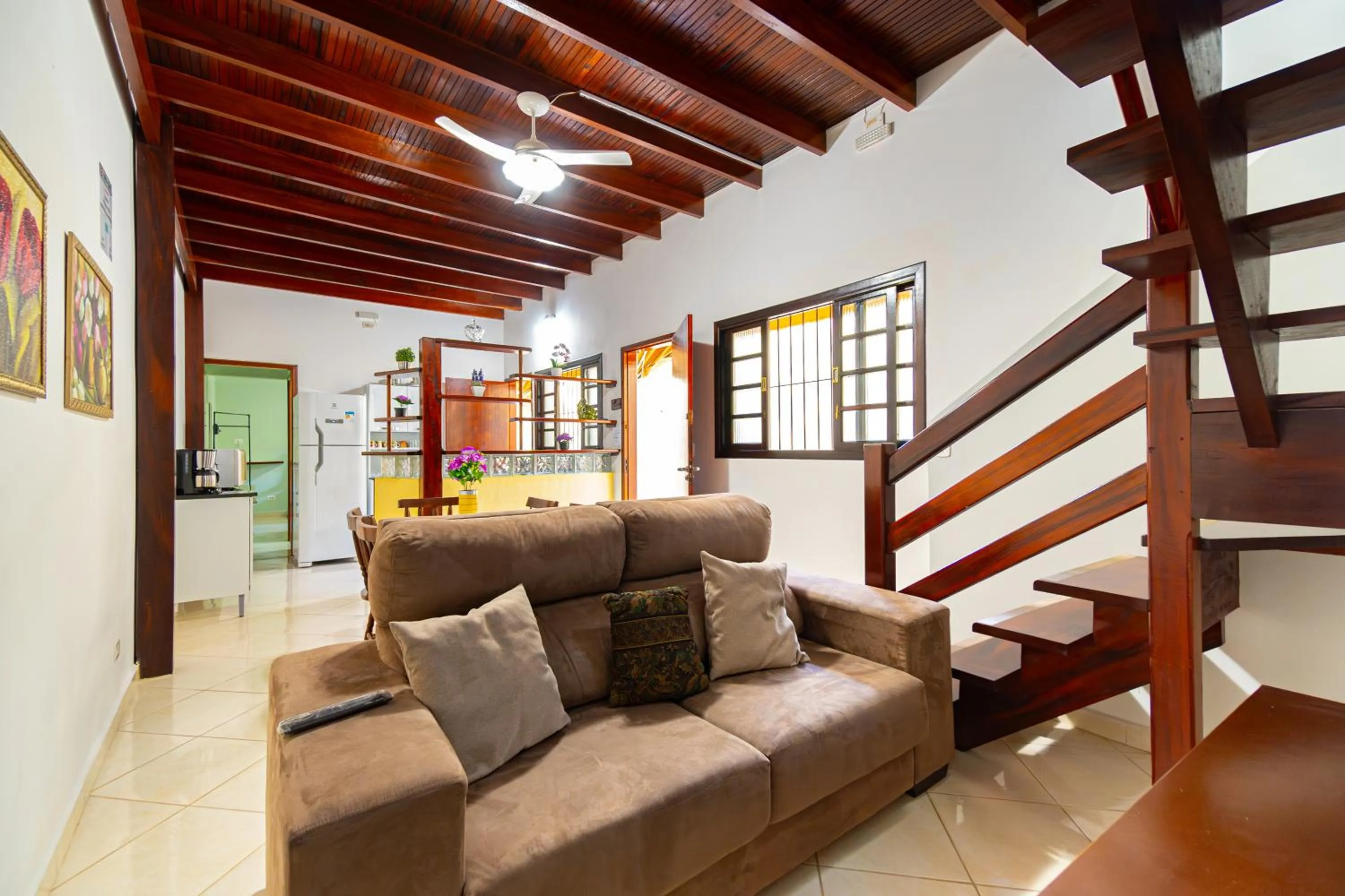 Seating area in Casa Gomes com 3 suítes e ar-condicionado até 12 pessoas em Ubatuba Itaguá