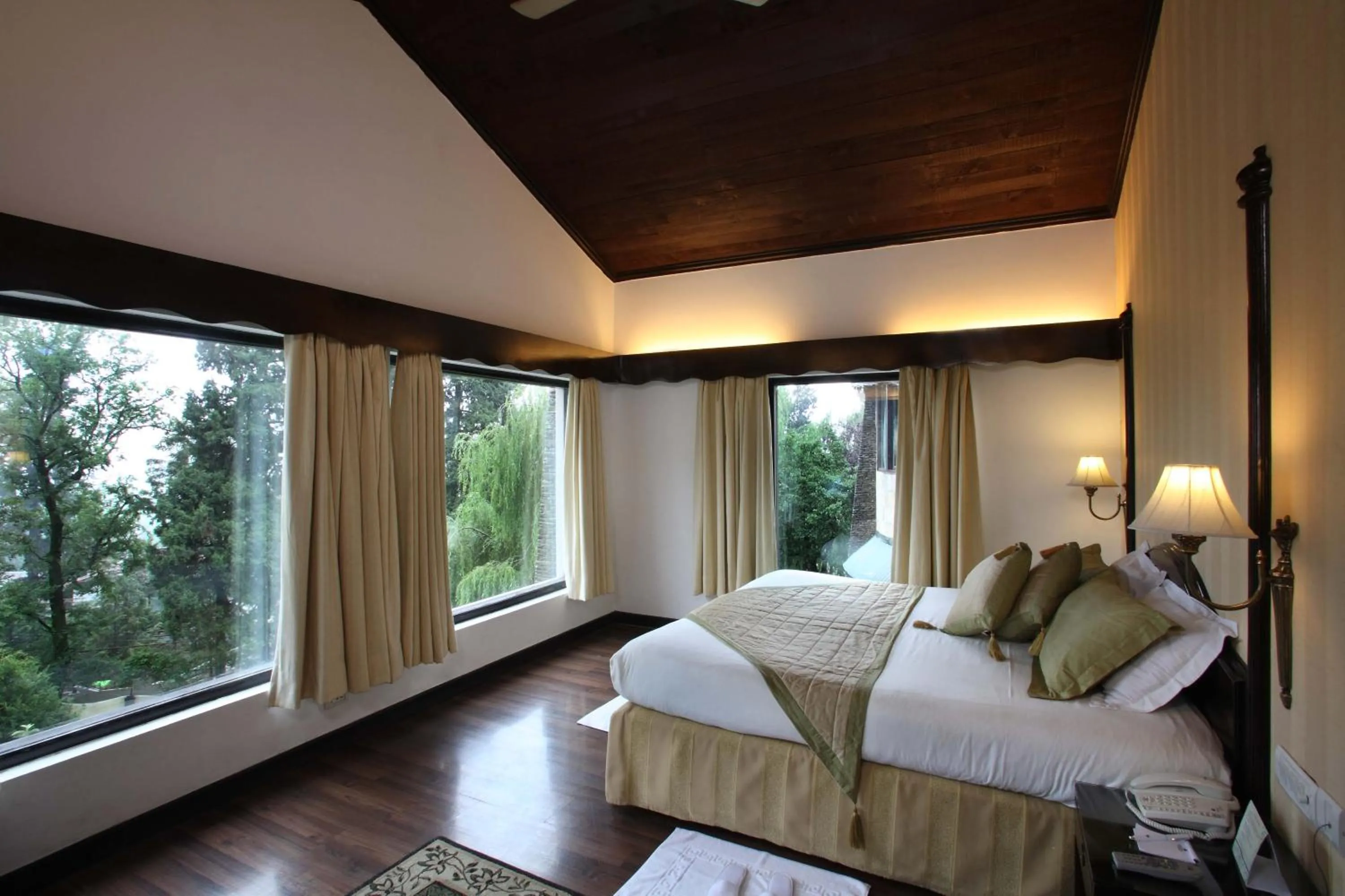 Bed in Shervani Hilltop Resort