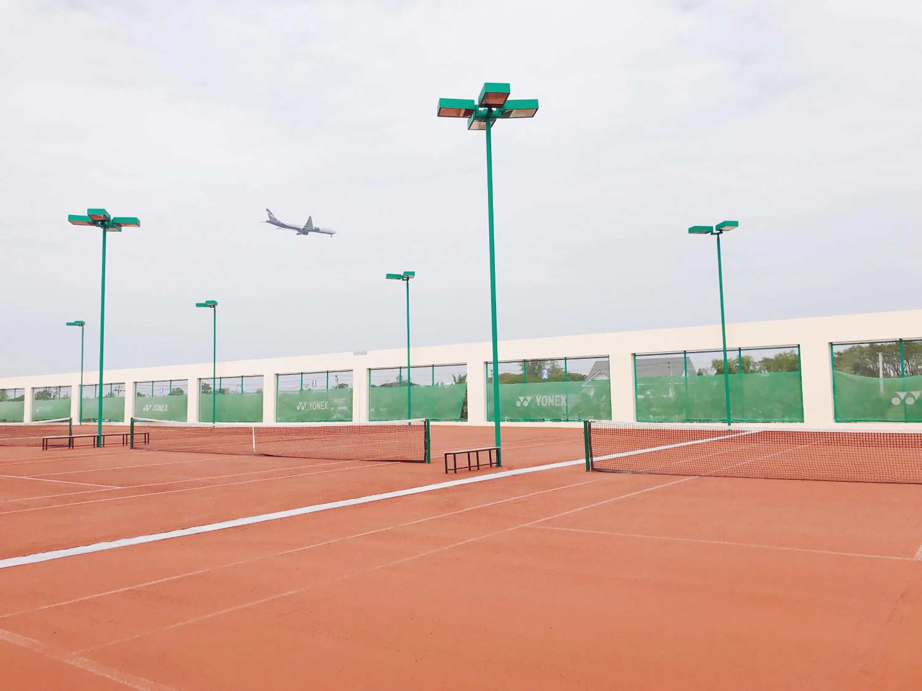 Tennis court in Eastin Thana City Golf Resort Bangkok