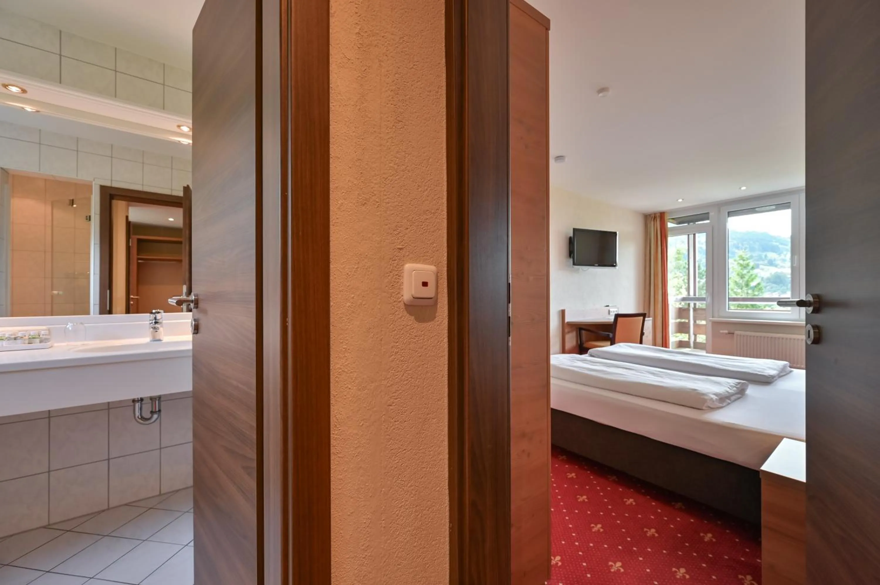 Bathroom, Bed in Rothenfels Panorama Hotel