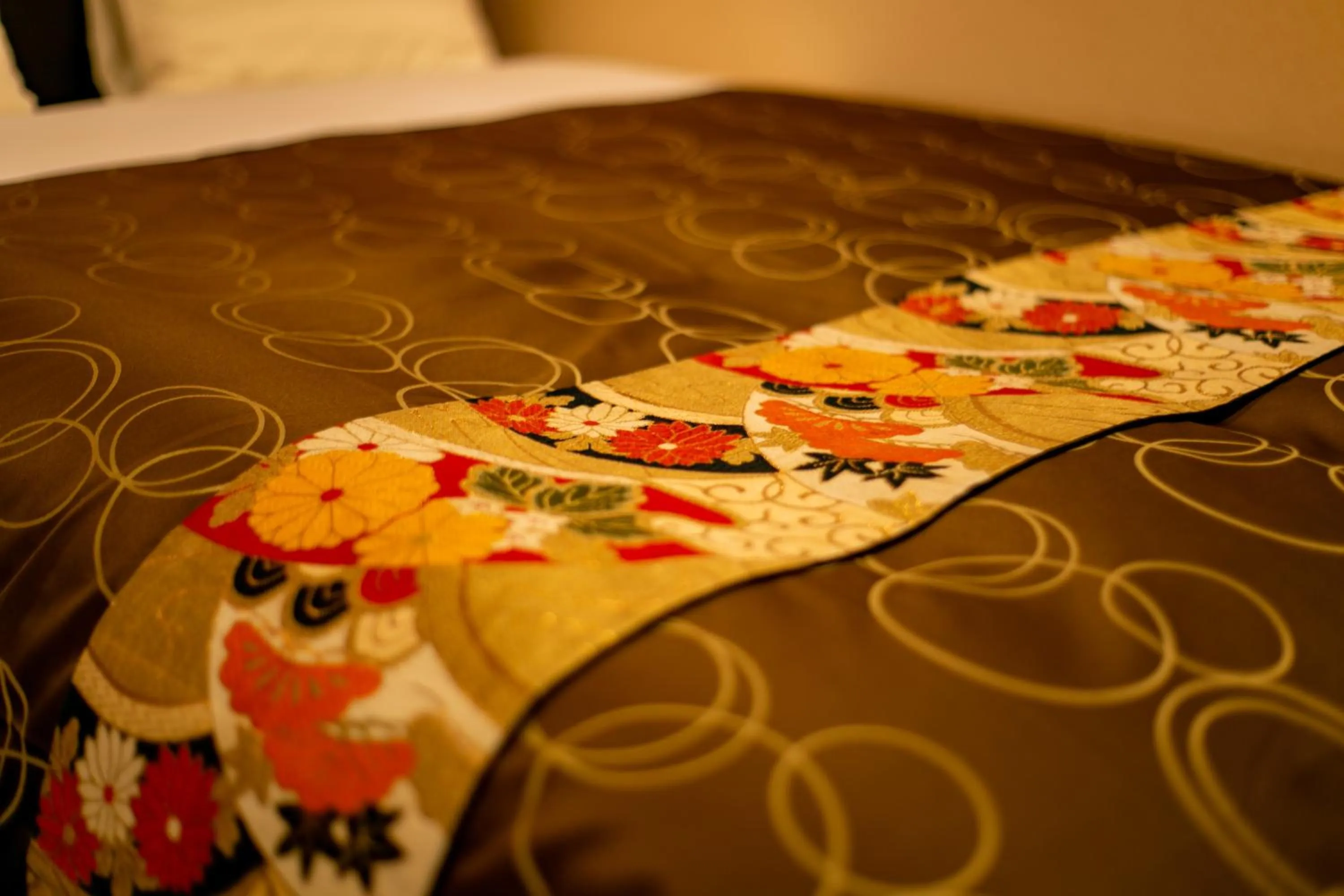 Decorative detail, Bed in Yufuin Lamp no Yado