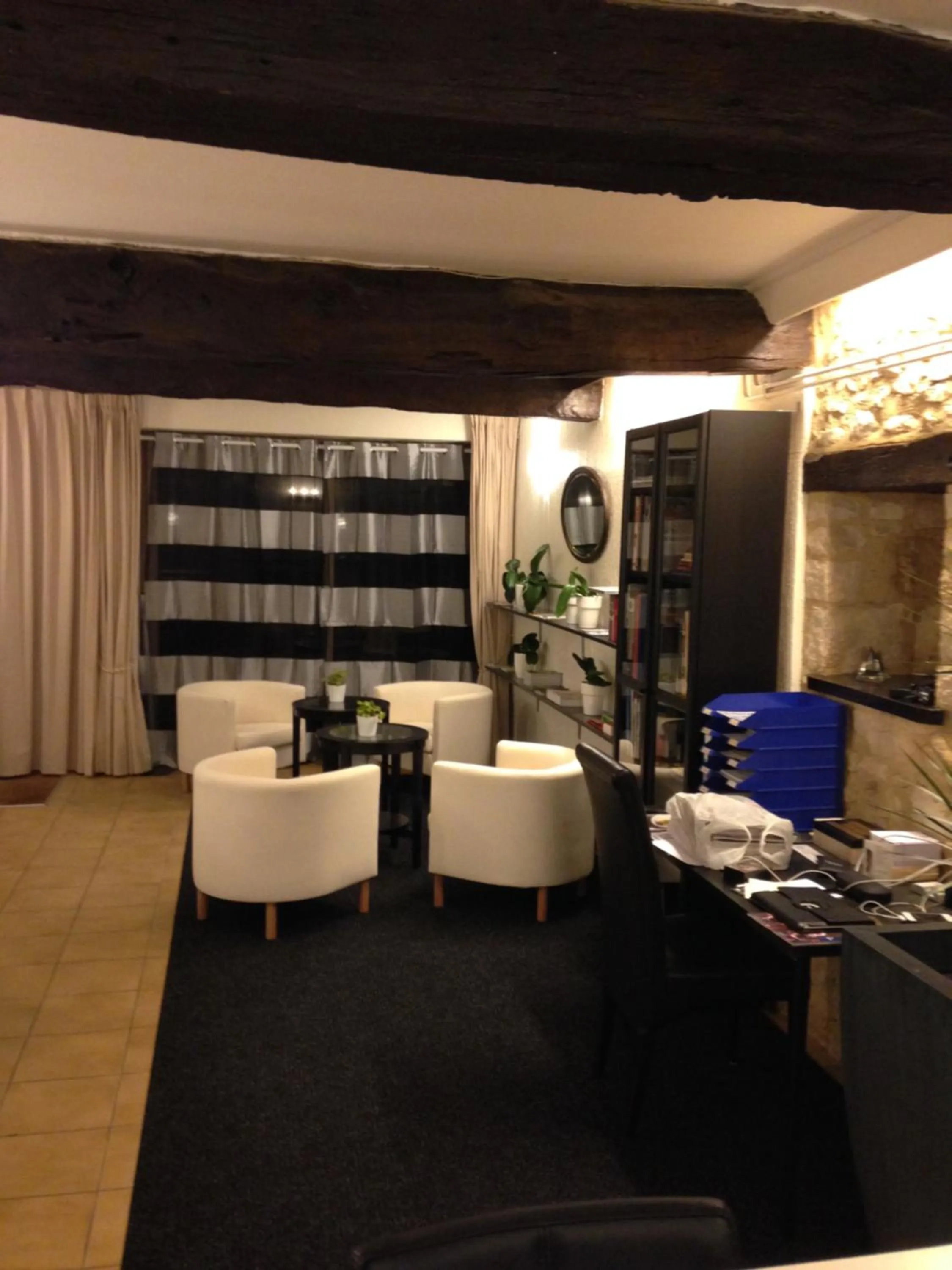 Communal lounge/ TV room in Logis Hôtel Restaurant La Bastide