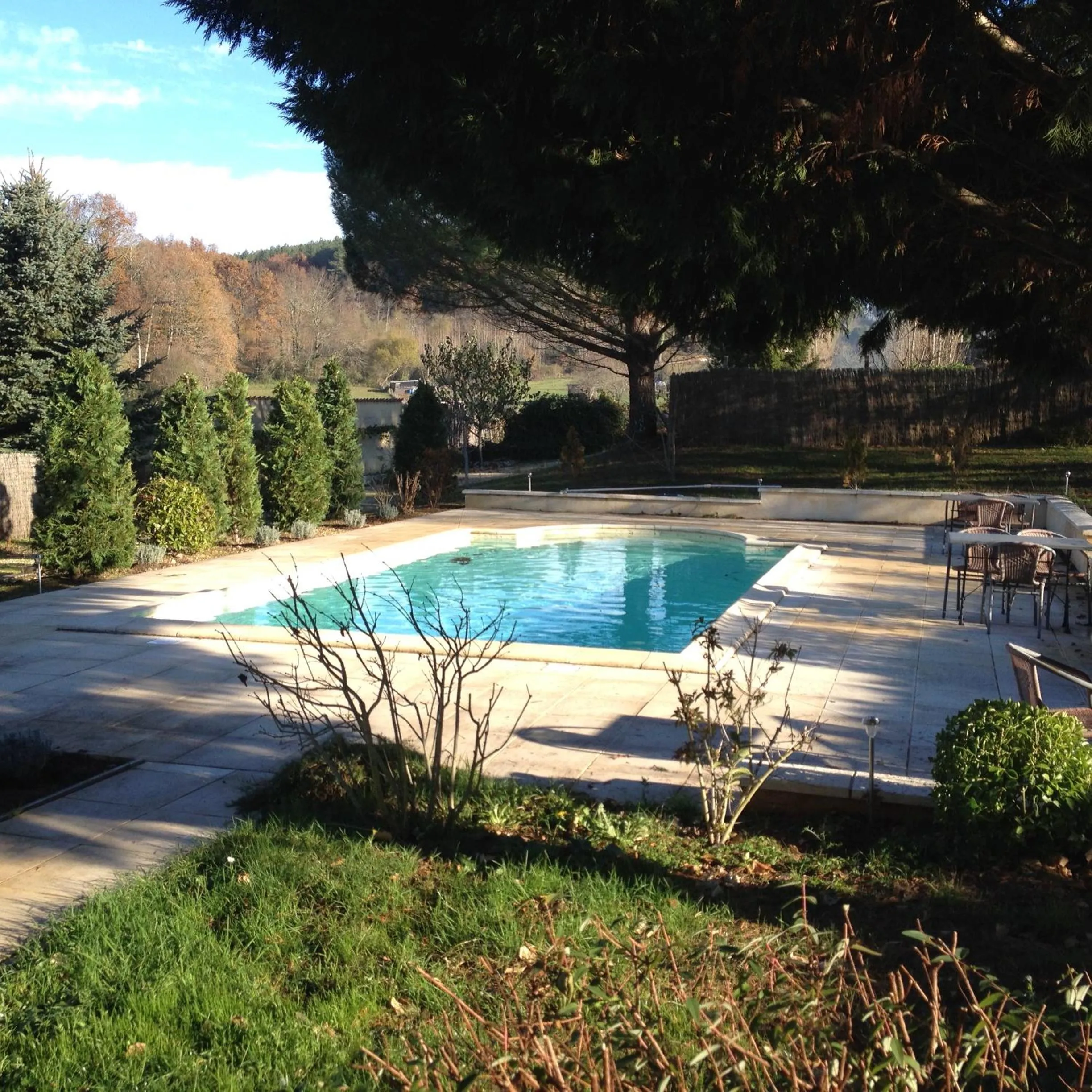 Garden in Logis Hôtel Restaurant La Bastide