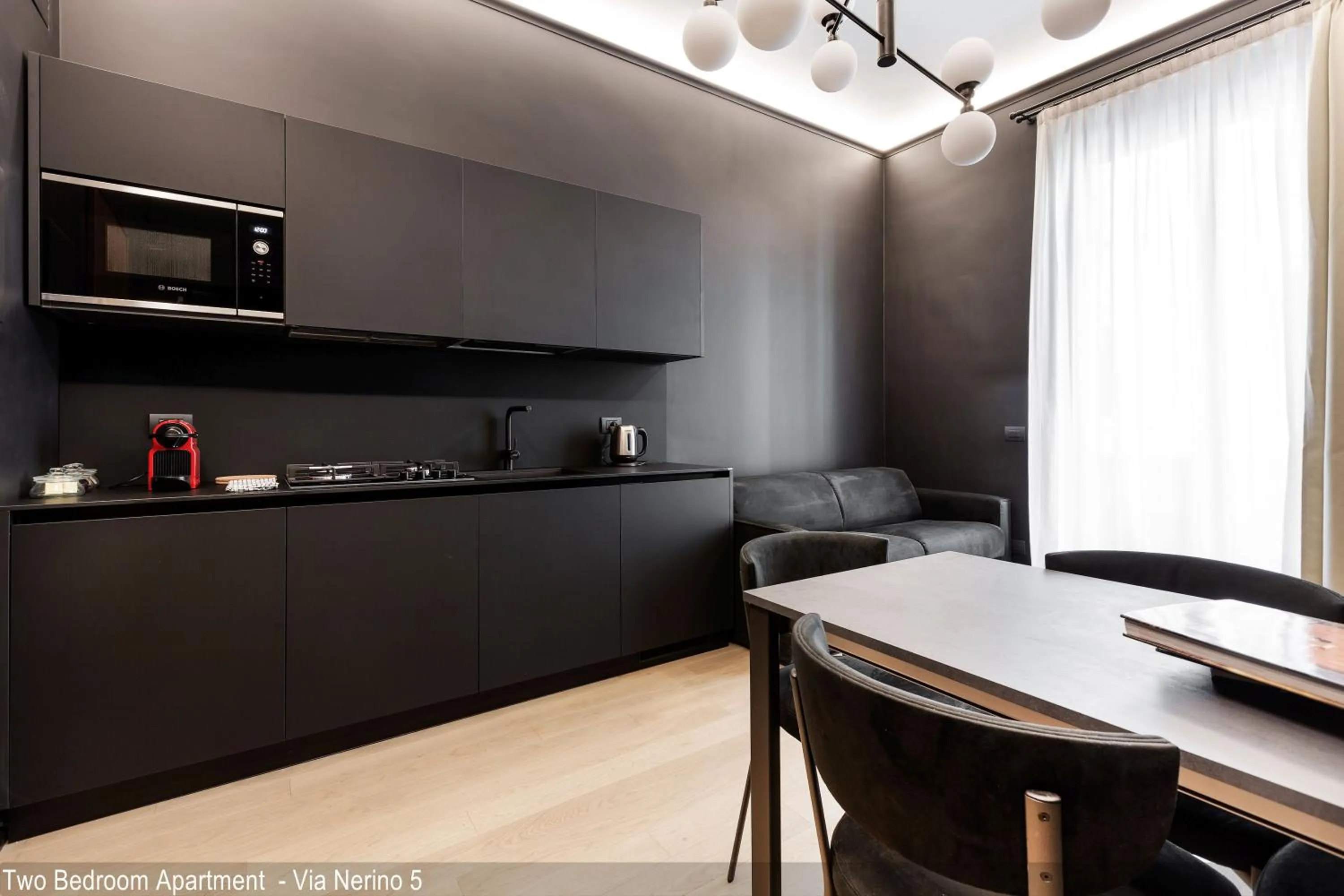 Kitchen or kitchenette in Brera Apartments in City Center