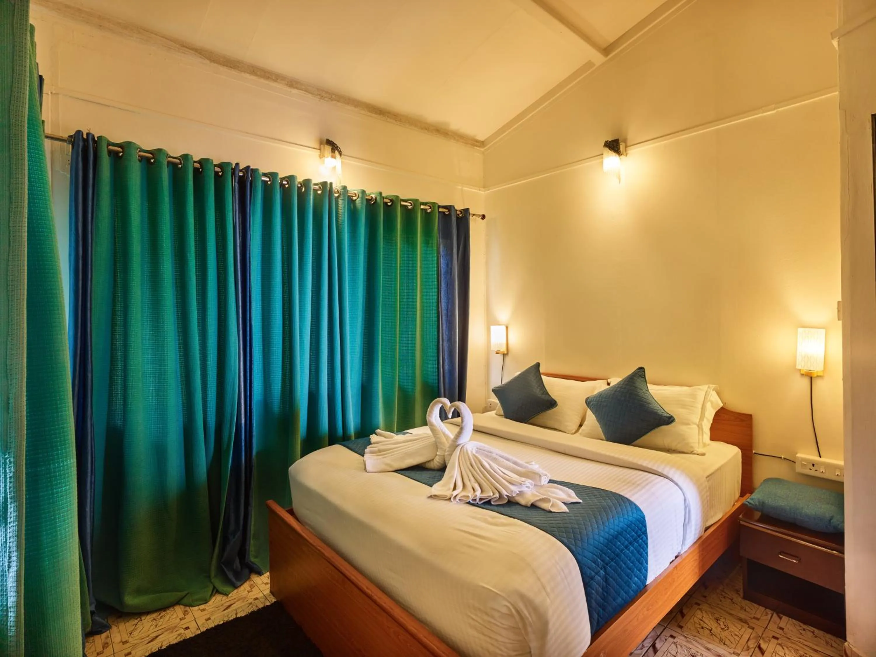 Bed in Deshadan Mountain Resort -The highest resort in Munnar