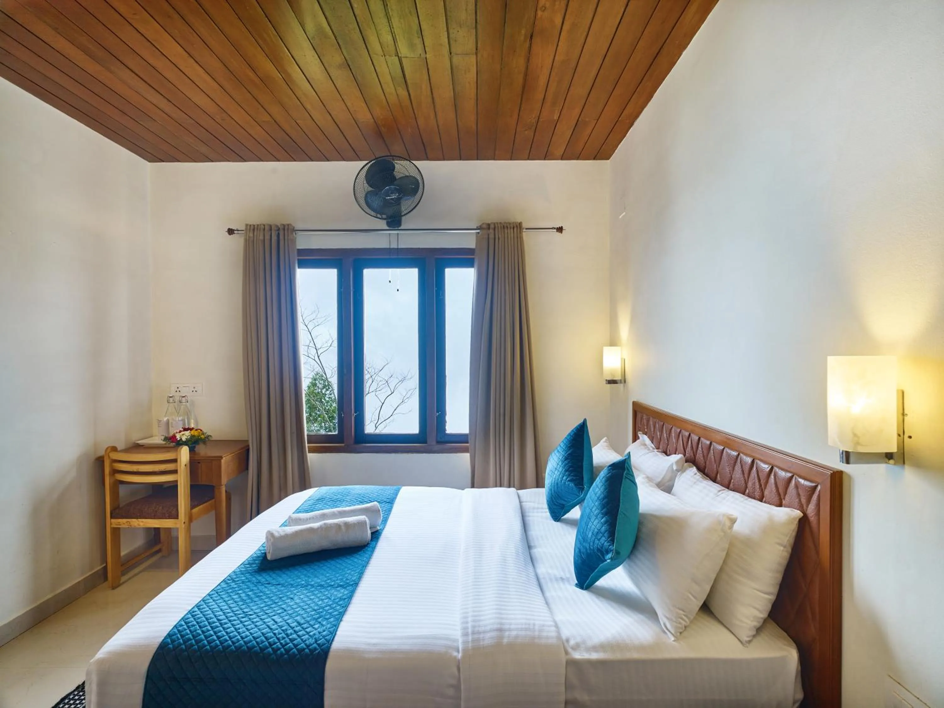 Bed in Deshadan Mountain Resort -The highest resort in Munnar