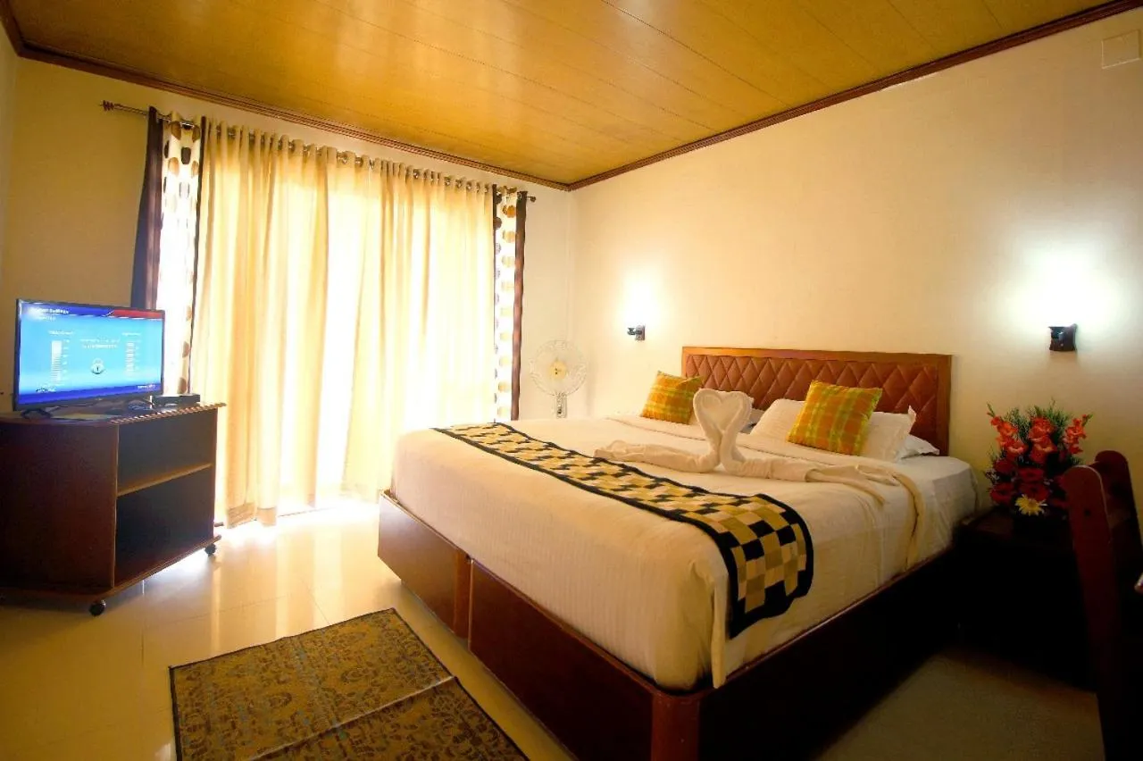 Bed in Deshadan Mountain Resort -The highest resort in Munnar