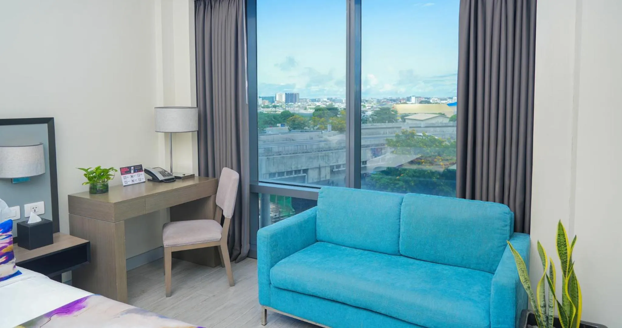View (from property/room), Bed in Savoy Hotel Manila near Airport NAIA Terminal 3 MNL